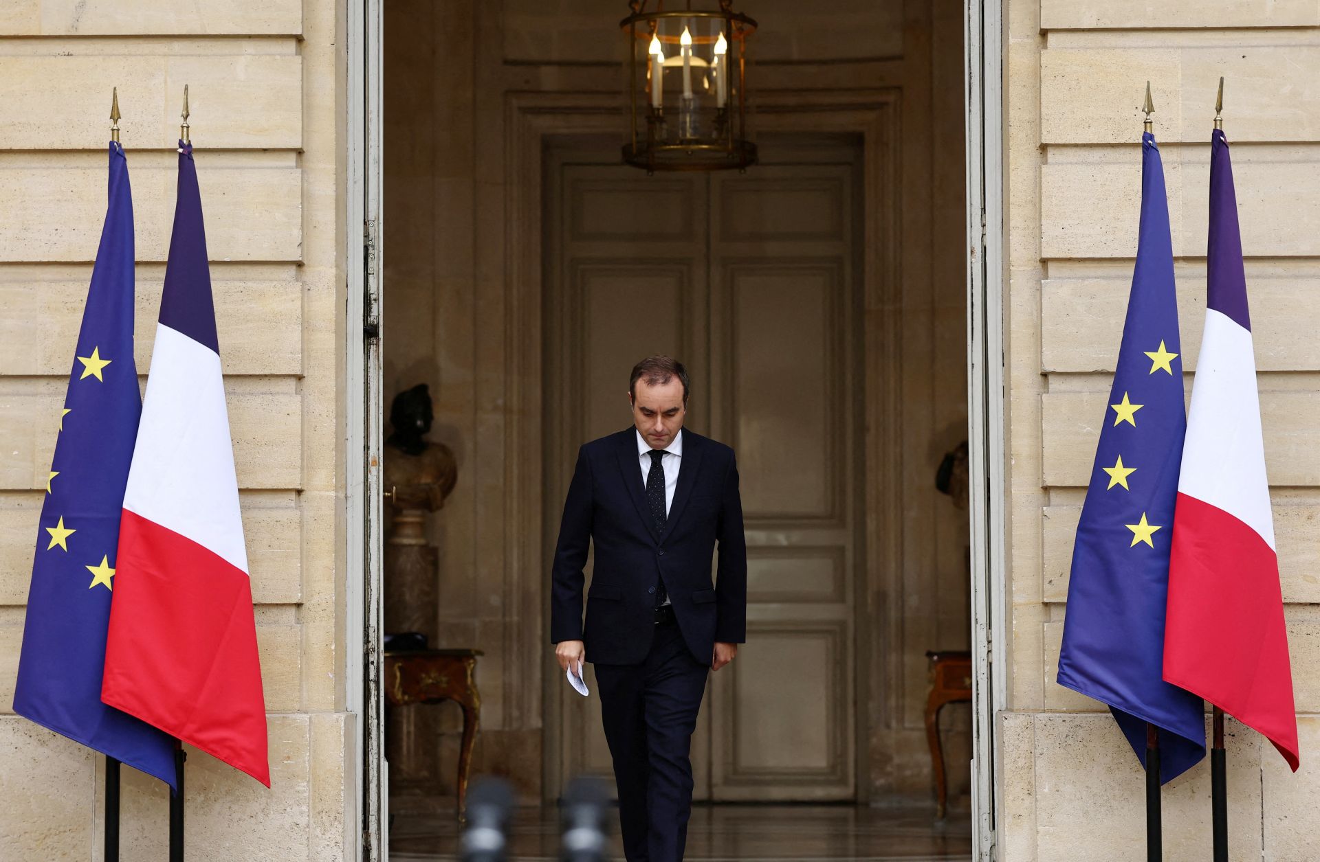 Outgoing French Prime Minister Sebastien Lecornu arrives to deliver a statement at the Hotel Matignon in Paris after submitting his resignation to French President Emmanuel Macron on Oct. 6, 2025. 
