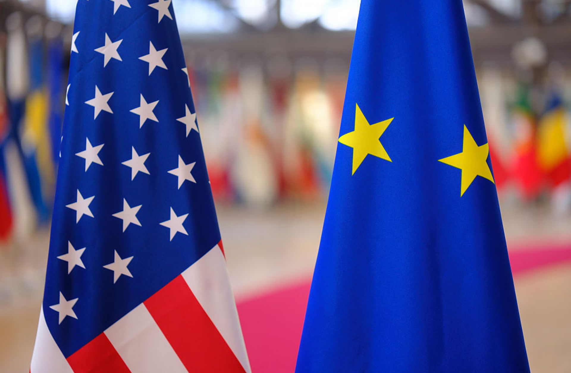 The U.S. and the EU flags are seen side by side on Nov. 21, 2025, in Brussels, Belgium. 