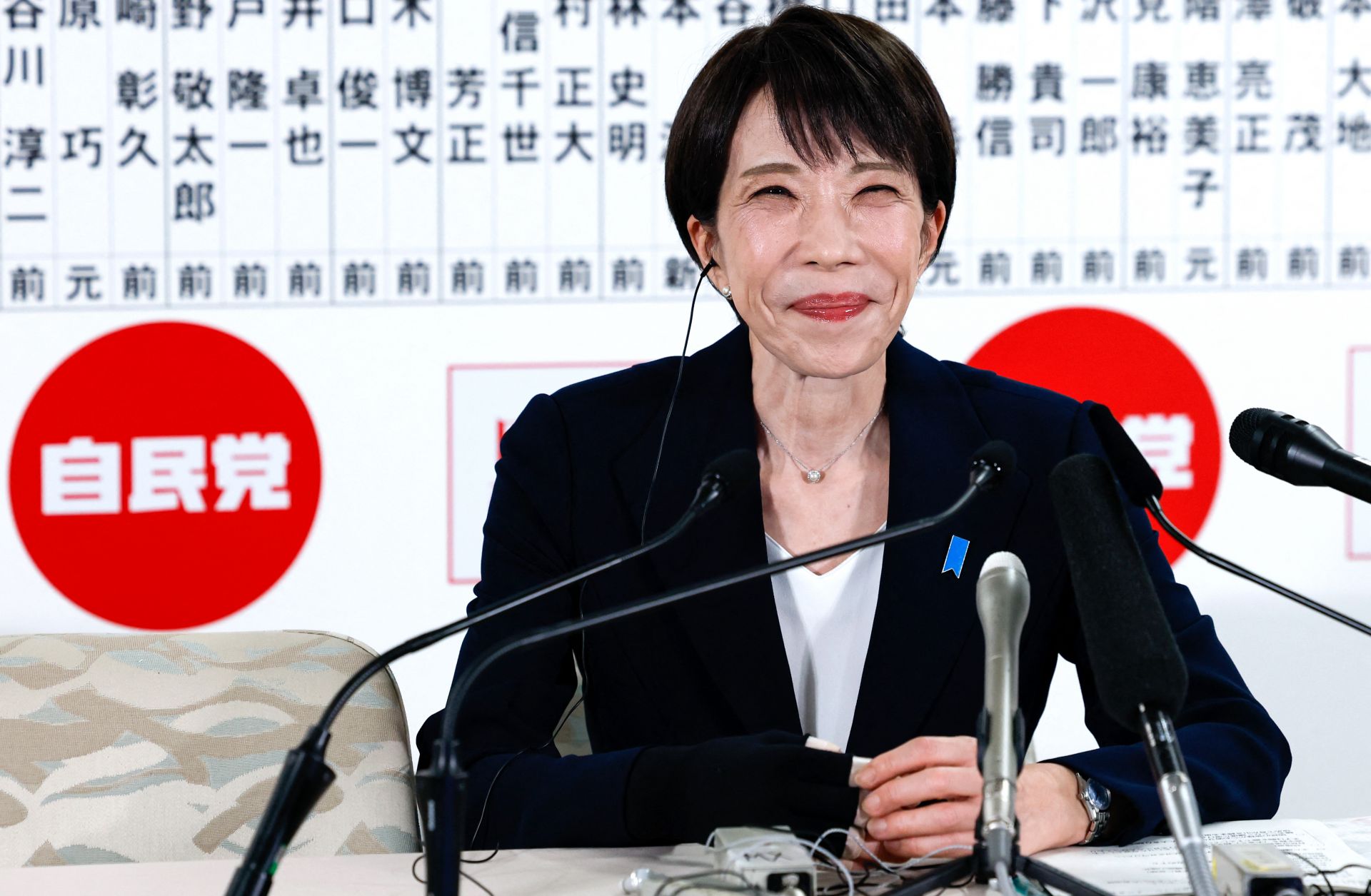 Japanese Prime Minister and President of the Liberal Democratic Party (LDP) Sanae Takaichi reacts as she speaks with media on the day of lower house elections at the LDP headquarters in Tokyo on Feb. 8, 2026. 