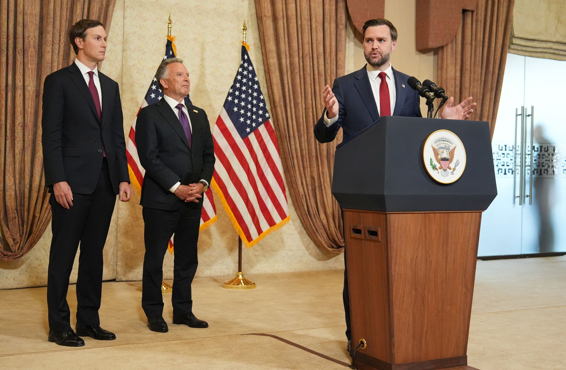 U.S. Vice President JD Vance speaks as special envoys Jared Kushner (L) and Steve Witkoff listen during a news conference after a meeting with representatives from Pakistan and Iran on April 12, 2026, in Islamabad, Pakistan. 