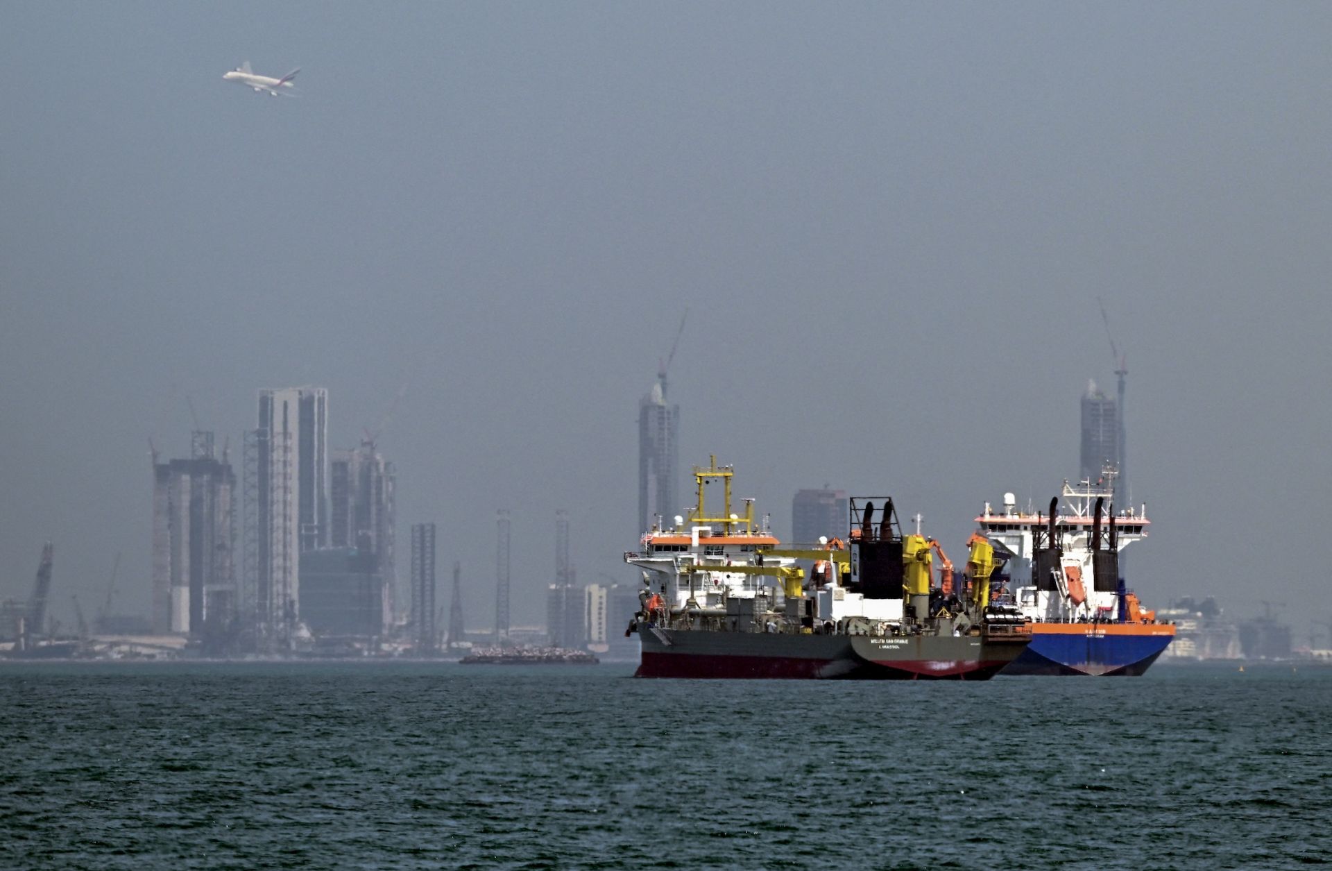 Commercial vessels are pictured offshore in Dubai on March 11, 2026. 