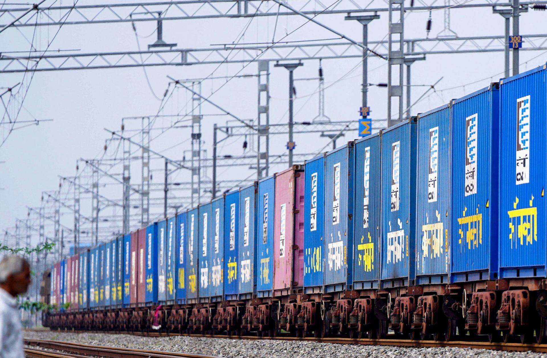 A freight train carrying cargo containers rides along a railway track in Ajmer, India, on Aug. 26, 2025. A freight train carrying cargo containers rides along a railway track in Ajmer, India, on Aug. 26, 2025.