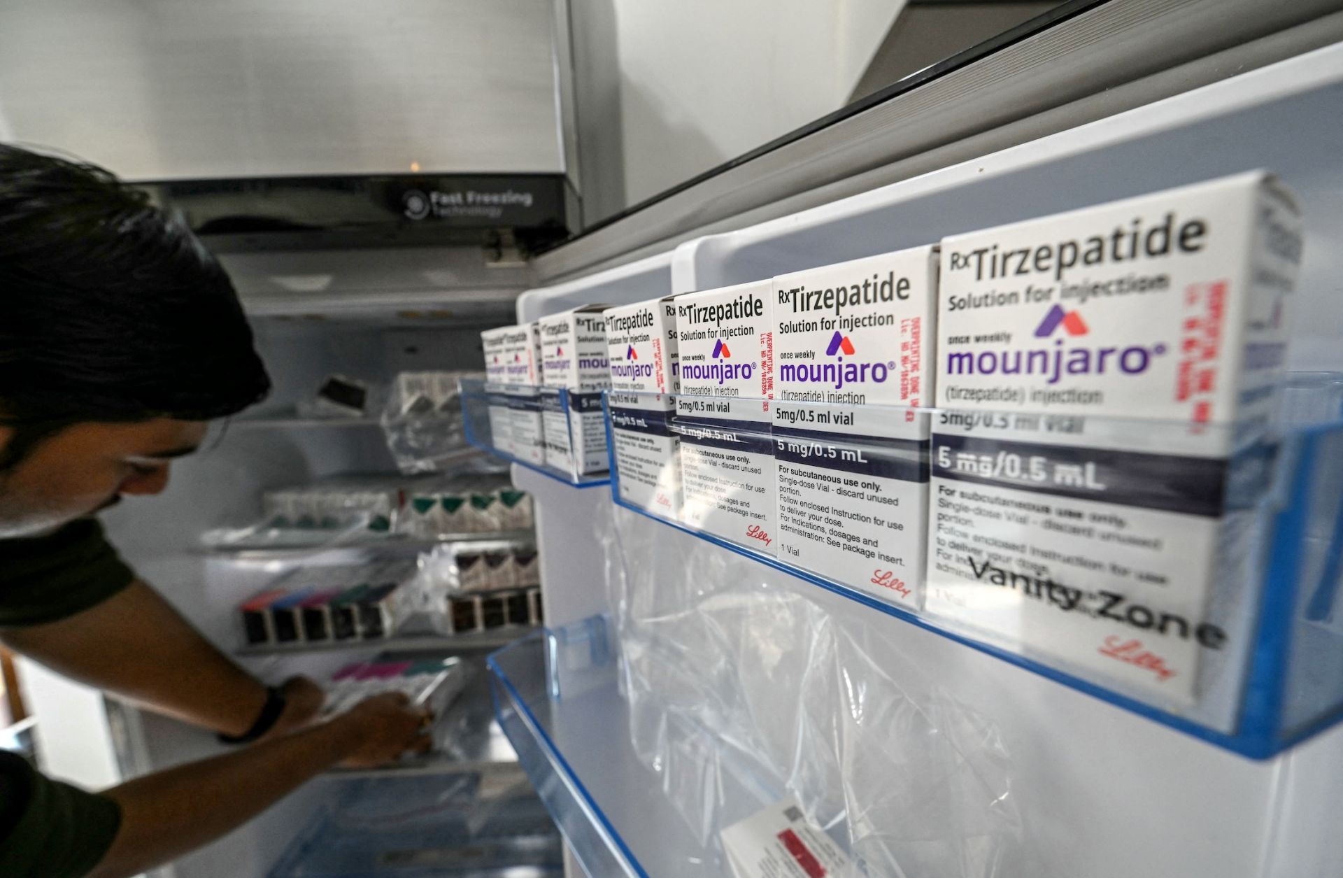 A medicine distributor stores Mounjaro (tirzepatide) self-injecting GLP-1 prefilled pens and vials in a fridge at his office in Thane, India, on March 20, 2026. A medicine distributor stores Mounjaro (tirzepatide) self-injecting GLP-1 prefilled pens and vials in a fridge at his office in Thane, India, on March 20, 2026.