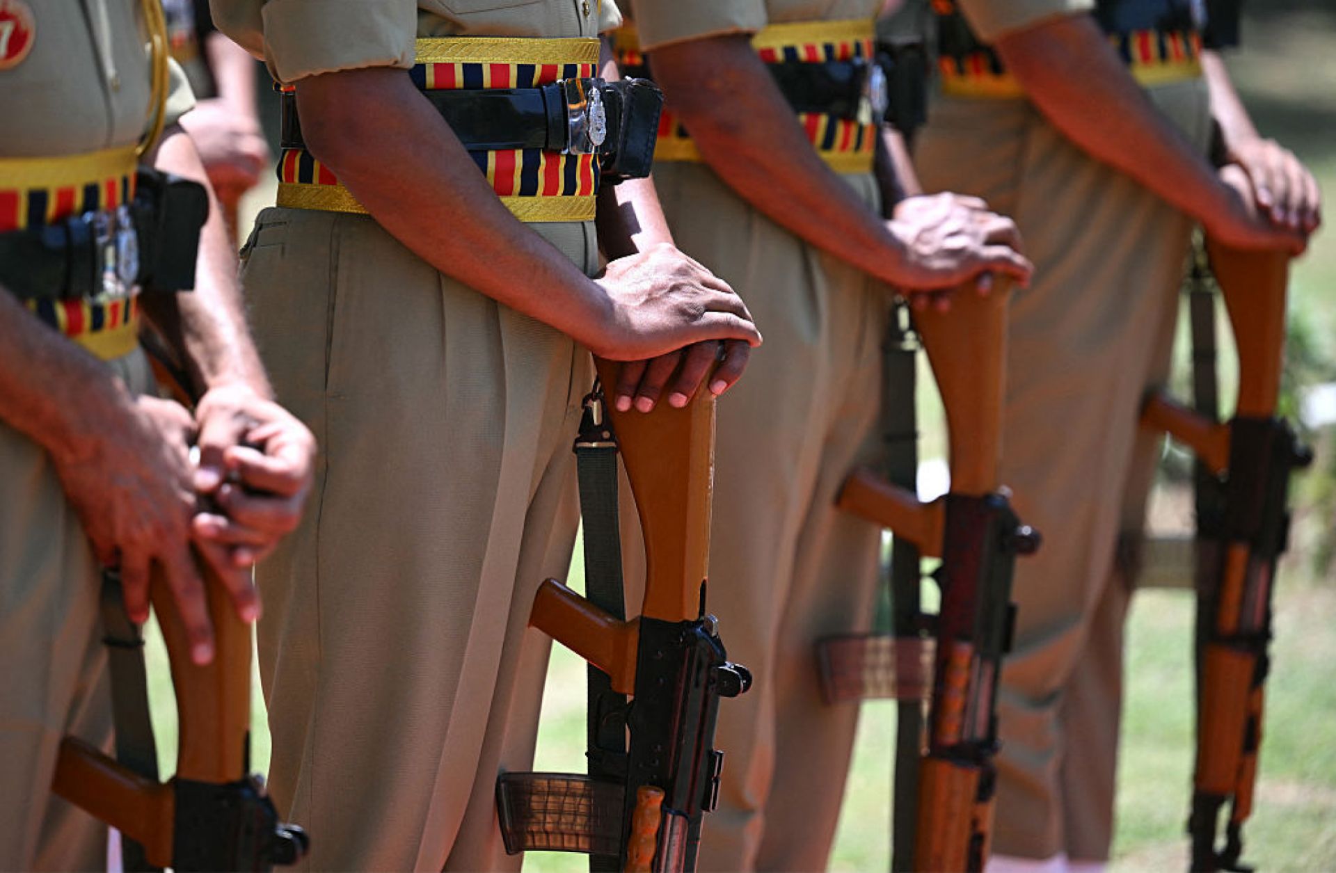 Indian soldiers pay respect during a wreath-laying ceremony for a soldier who was killed during a cross-border firing between India and Pakistan, in Jammu on May 12, 2025. 