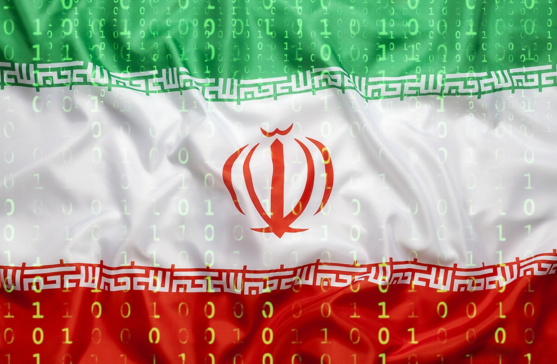 A digital illustration shows a binary code overlaying the Iranian flag.