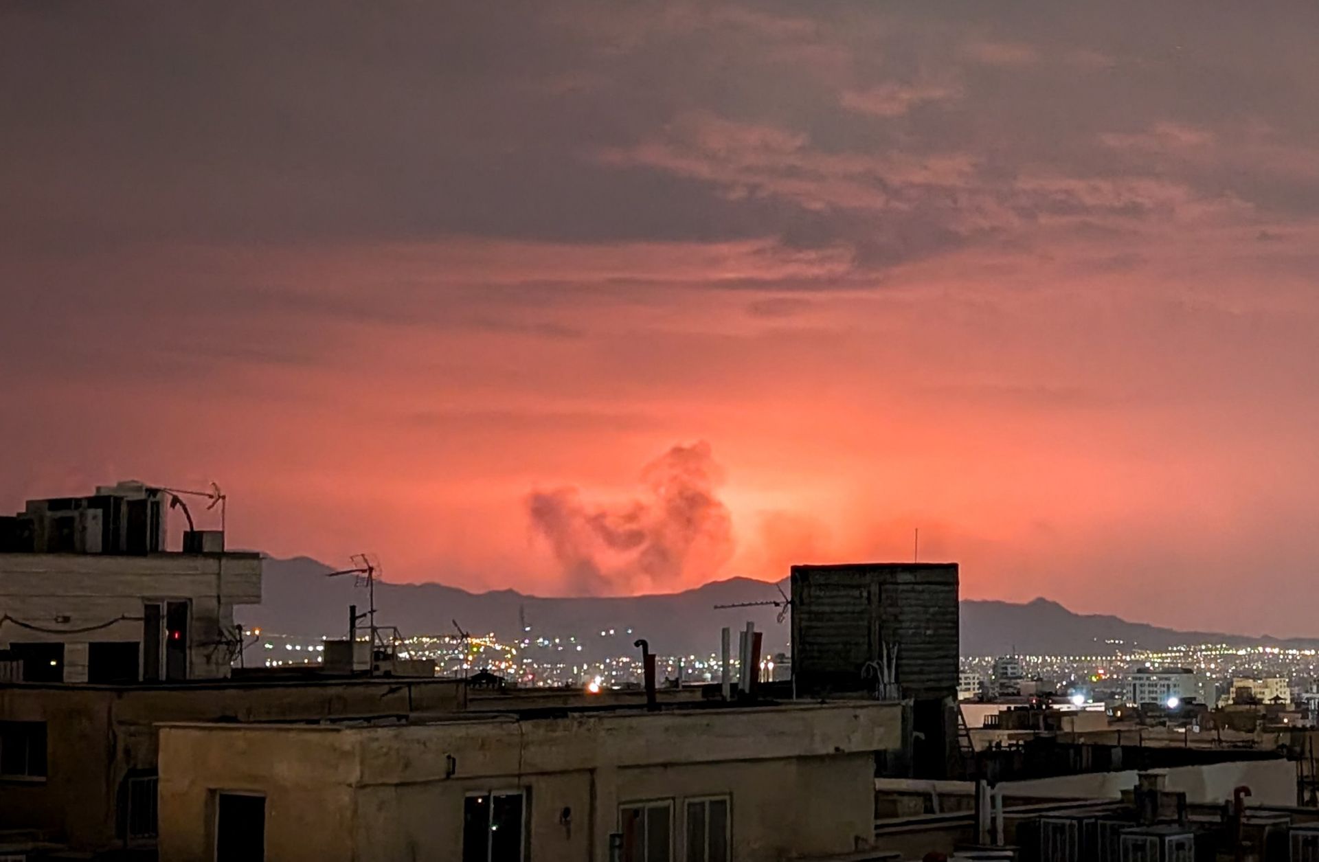 Plumes of smoke rise following reported explosions in Tehran on March 2, 2026, after U.S. and Israeli strikes on Iran on Feb. 28 killed Supreme Leader Ayatollah Ali Khamenei and other top military leaders, prompting a new wave of Iranian retaliatory missile attacks across the region. 