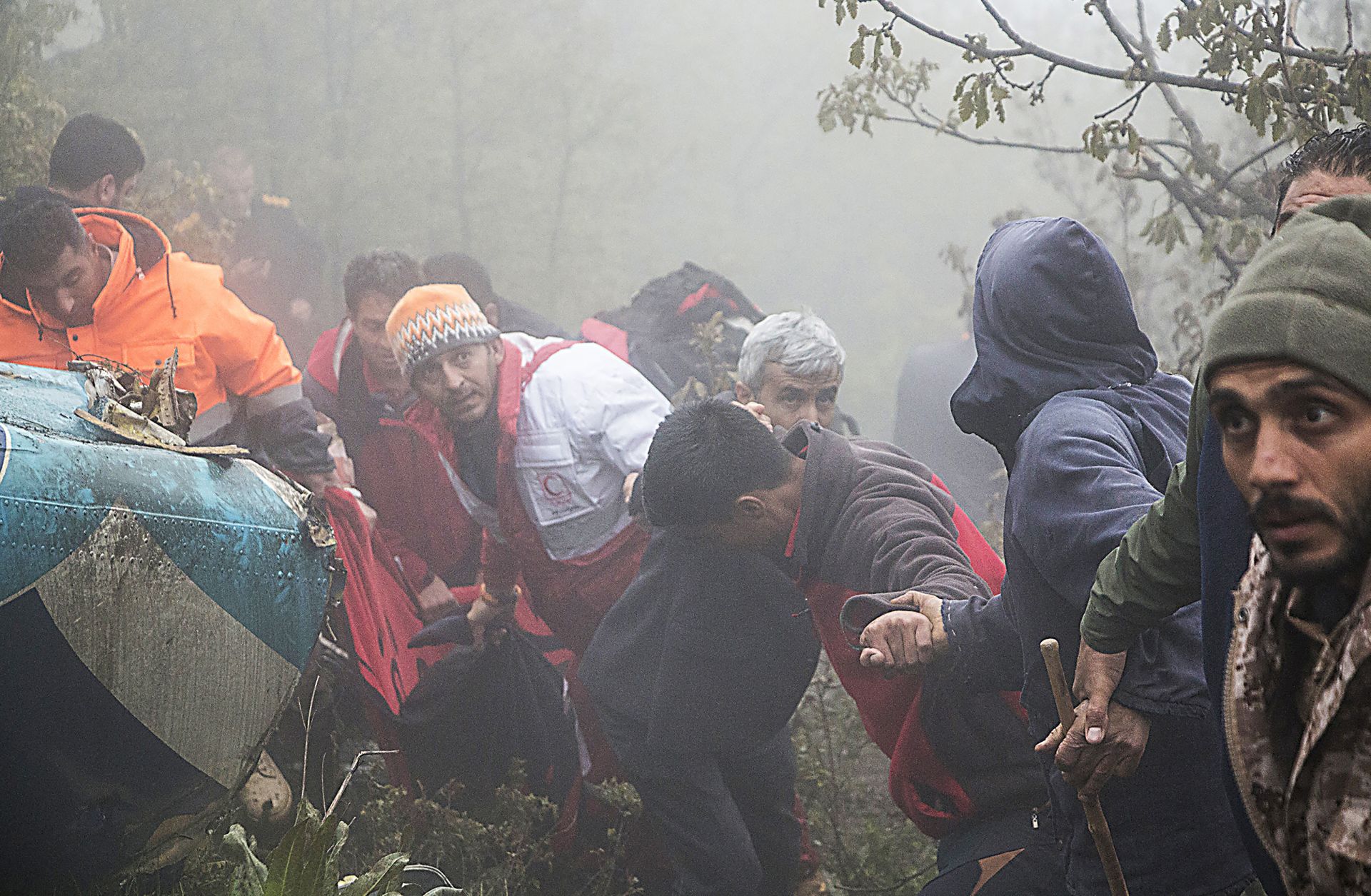 Rescue team members work at the crash site of a helicopter carrying Iranian President Ebrahim Raisi in Varzaghan, in northwestern Iran, on May 20, 2024. Raisi was declared dead on May 20 after rescue teams found his crashed helicopter.
