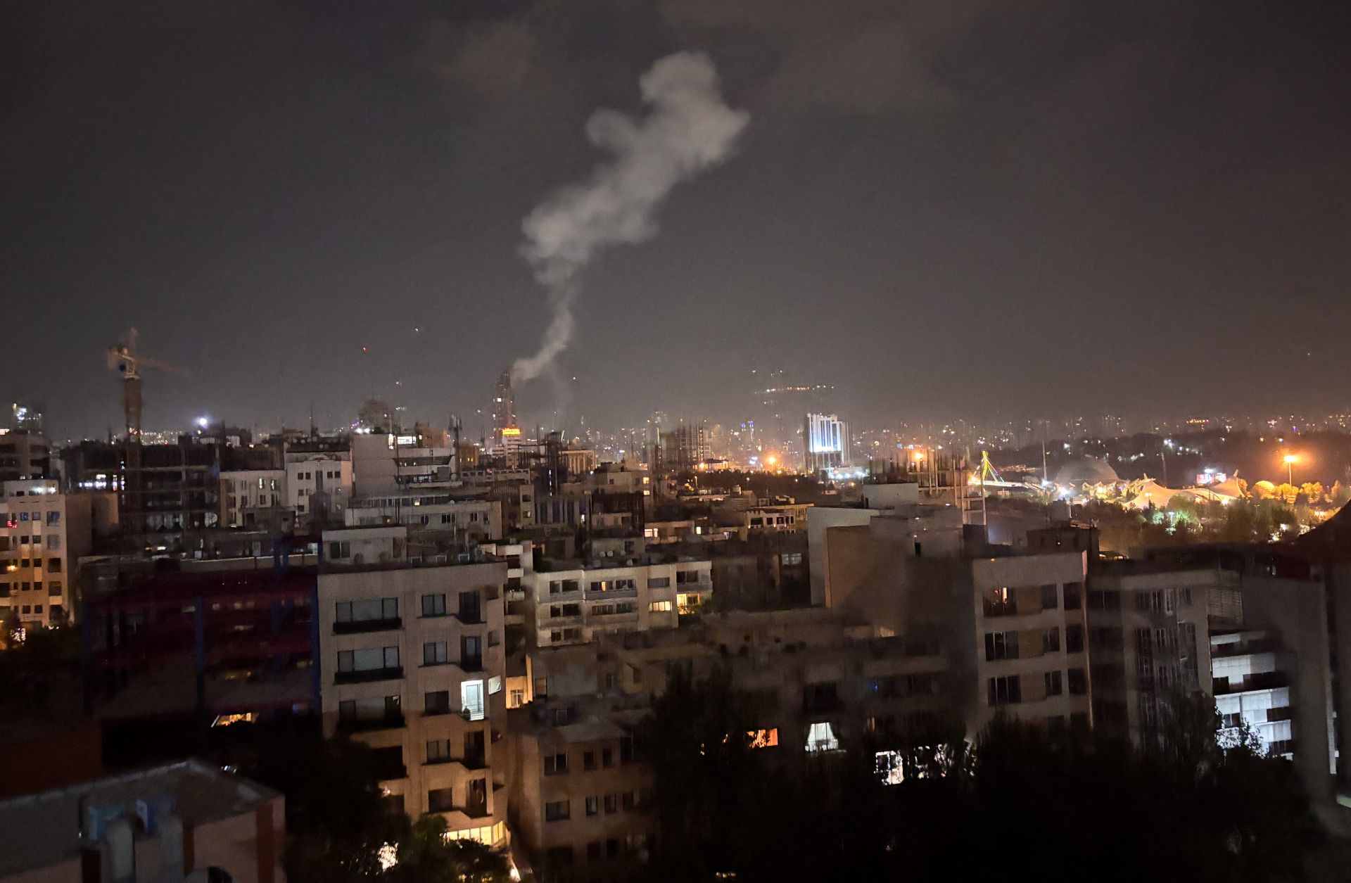 Smoke rises from a location allegedly targeted in Israel's wave of strikes June 13, 2025, in Tehran, Iran.