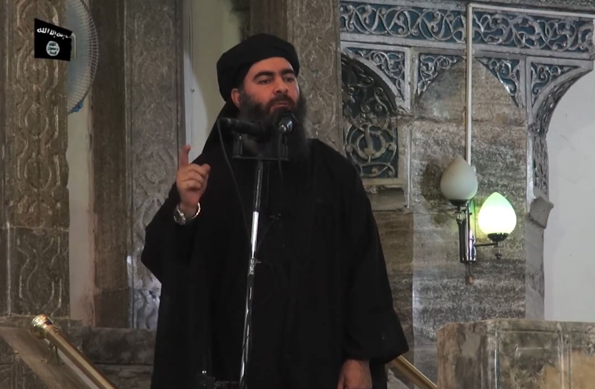 This July 5, 2014, photo shows an image grab taken from a propaganda video released by al-Furqan Media showing Islamic State leader Abu Bakr al-Baghdadi as he declares himself caliph in Mosul.