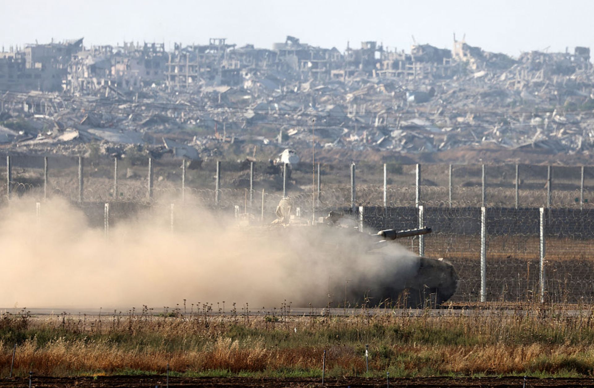An Israeli tank rolls along the fence on the border with the Gaza Strip on June 4, 2025. An Israeli tank rolls along the fence on the border with the Gaza Strip on June 4, 2025.