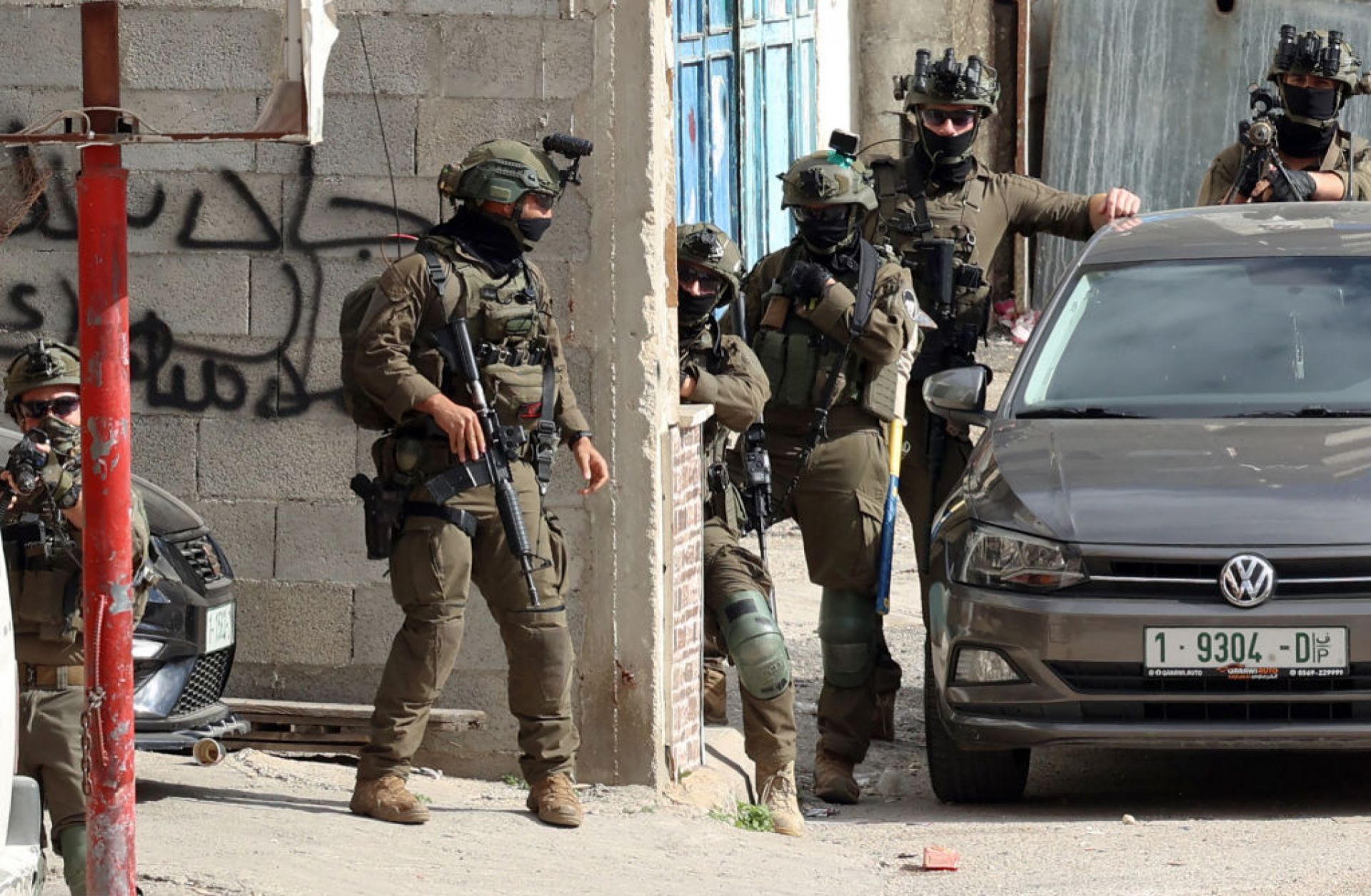 Israeli soldiers conduct a raid in the West Bank on March 19, 2025. 