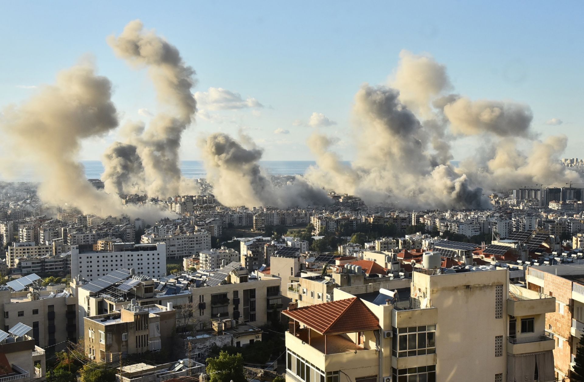 Smoke billows above Beirut's southern suburbs following an Israeli airstrike on Nov. 26, 2024, amid the ongoing war between Israel and Hezbollah. 