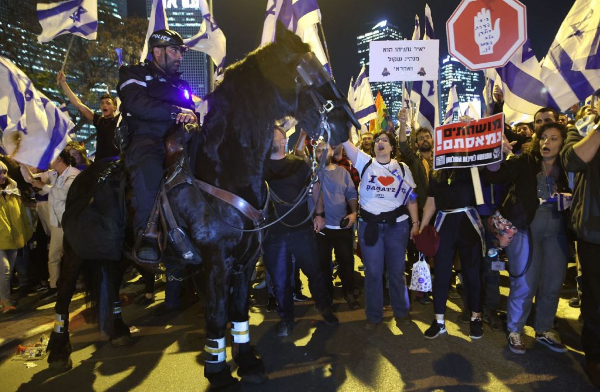 A mounted policeman stands guard during a March 27, 2023, protest in Tel Aviv, Israel.