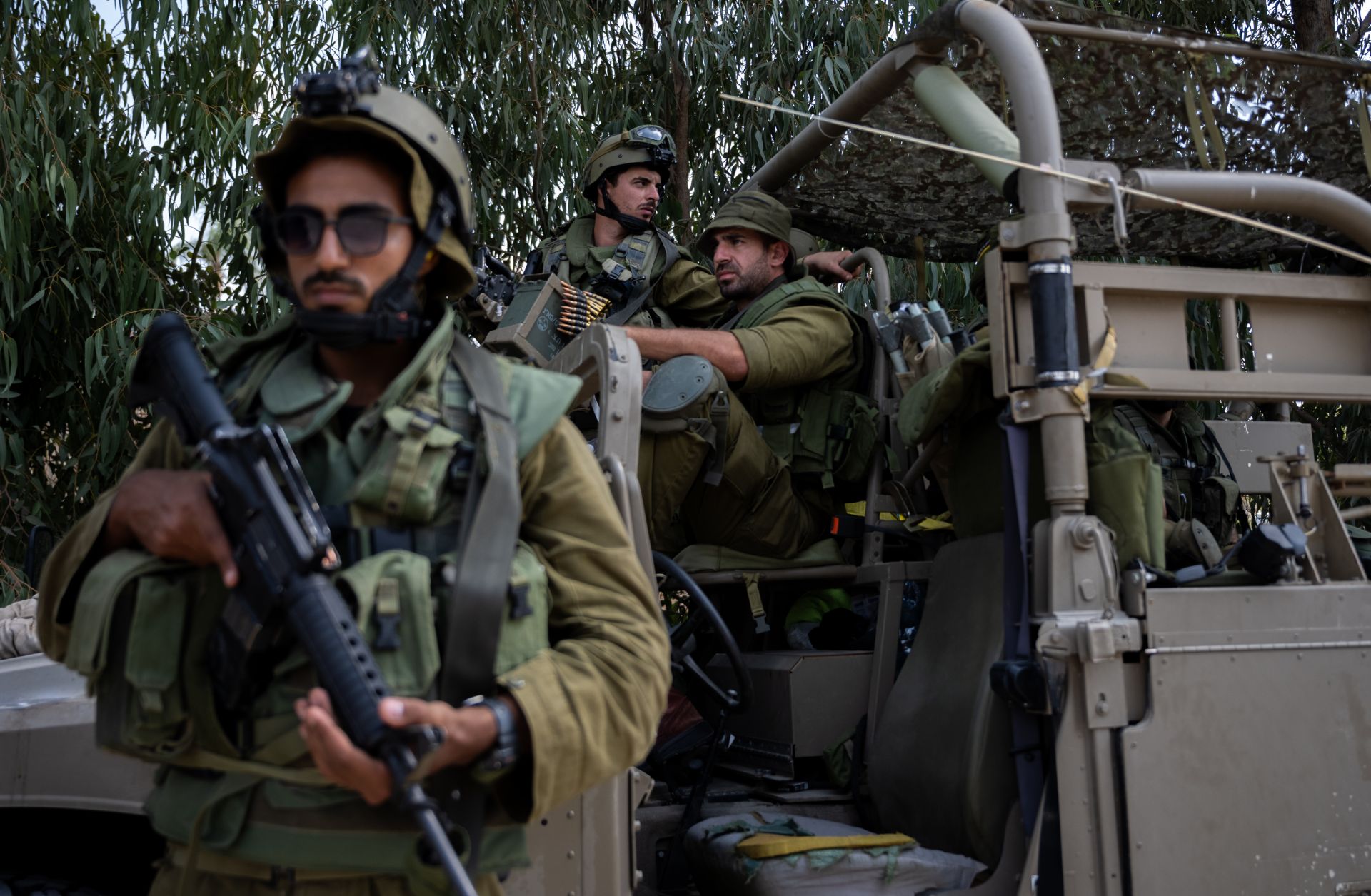 Israel Defense Forces soldiers guard an area around the Israeli settlement Kfar Azza on Oct. 10, 2023, after Hamas militants killed dozens of civilians there days earlier.
