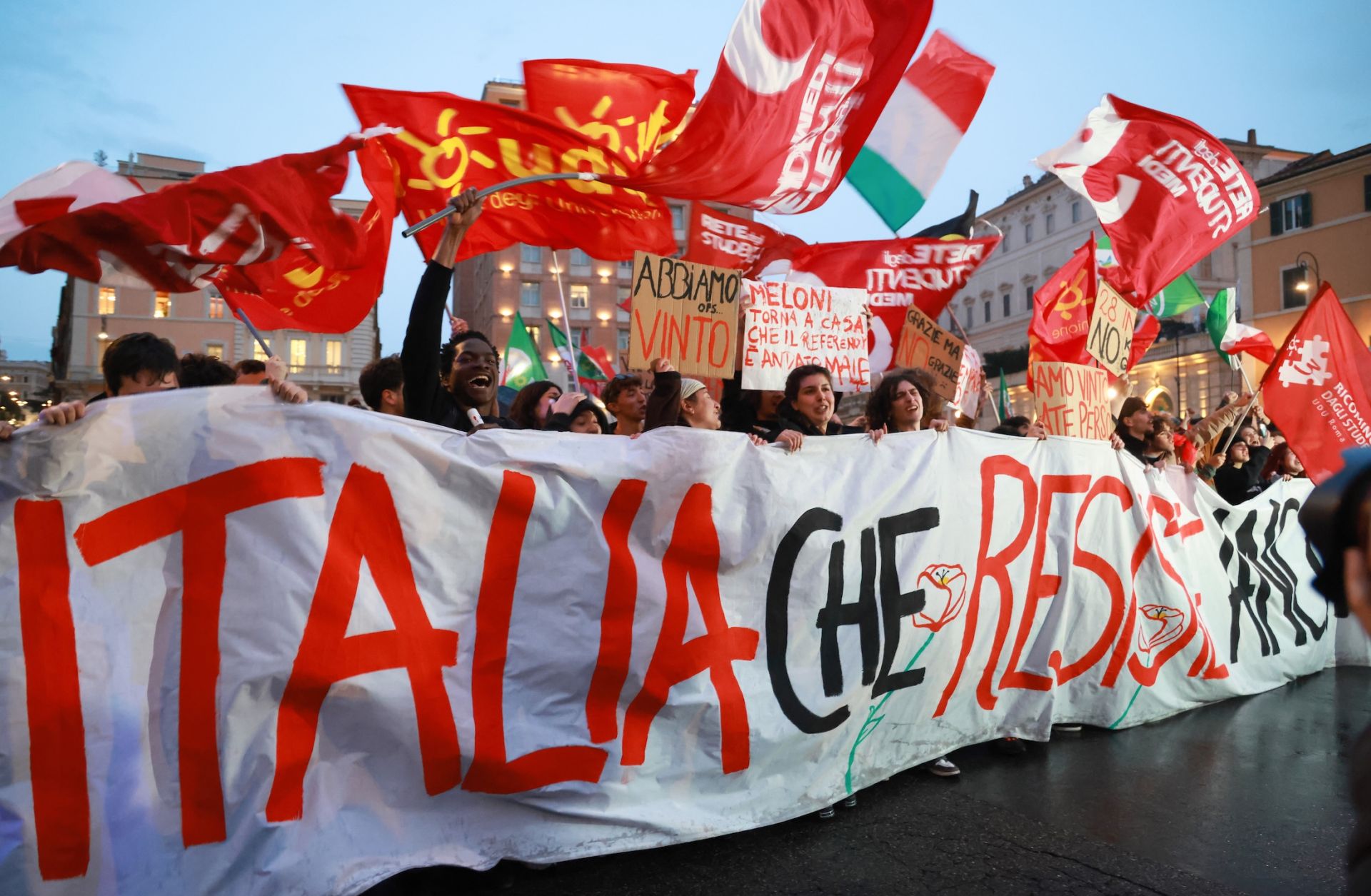 Opposition supporters celebrate the defeat of a referendum on justice reform March 23 in Rome.