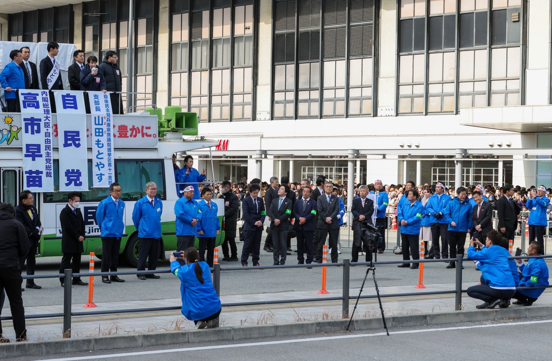 Japanese Prime Minister Sanae Takaichi (top, 5th from left) speaks during the election campaign rally on Jan. 29, 2026, in Himeji, Japan. 