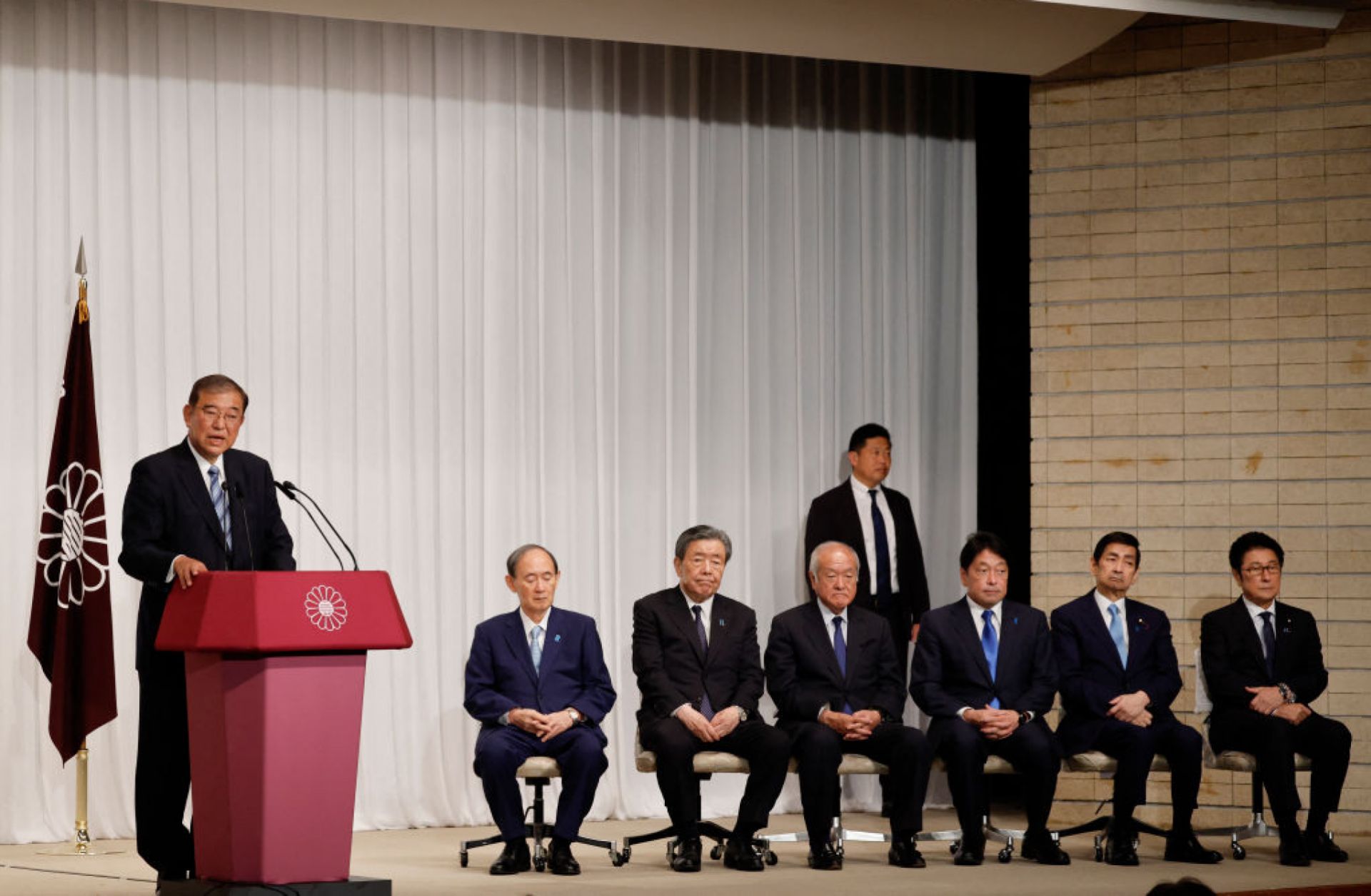 Japanese Prime Minister Shigeru Ishiba (left) speaks next to leaders of his ruling Liberal Democratic Party (LDP) during a press conference at the LDP's headquarters in Tokyo on Oct. 28, 2024. Japanese Prime Minister Shigeru Ishiba (left) speaks next to leaders of his ruling Liberal Democratic Party (LDP) during a press conference at the LDP's headquarters in Tokyo on Oct. 28, 2024.