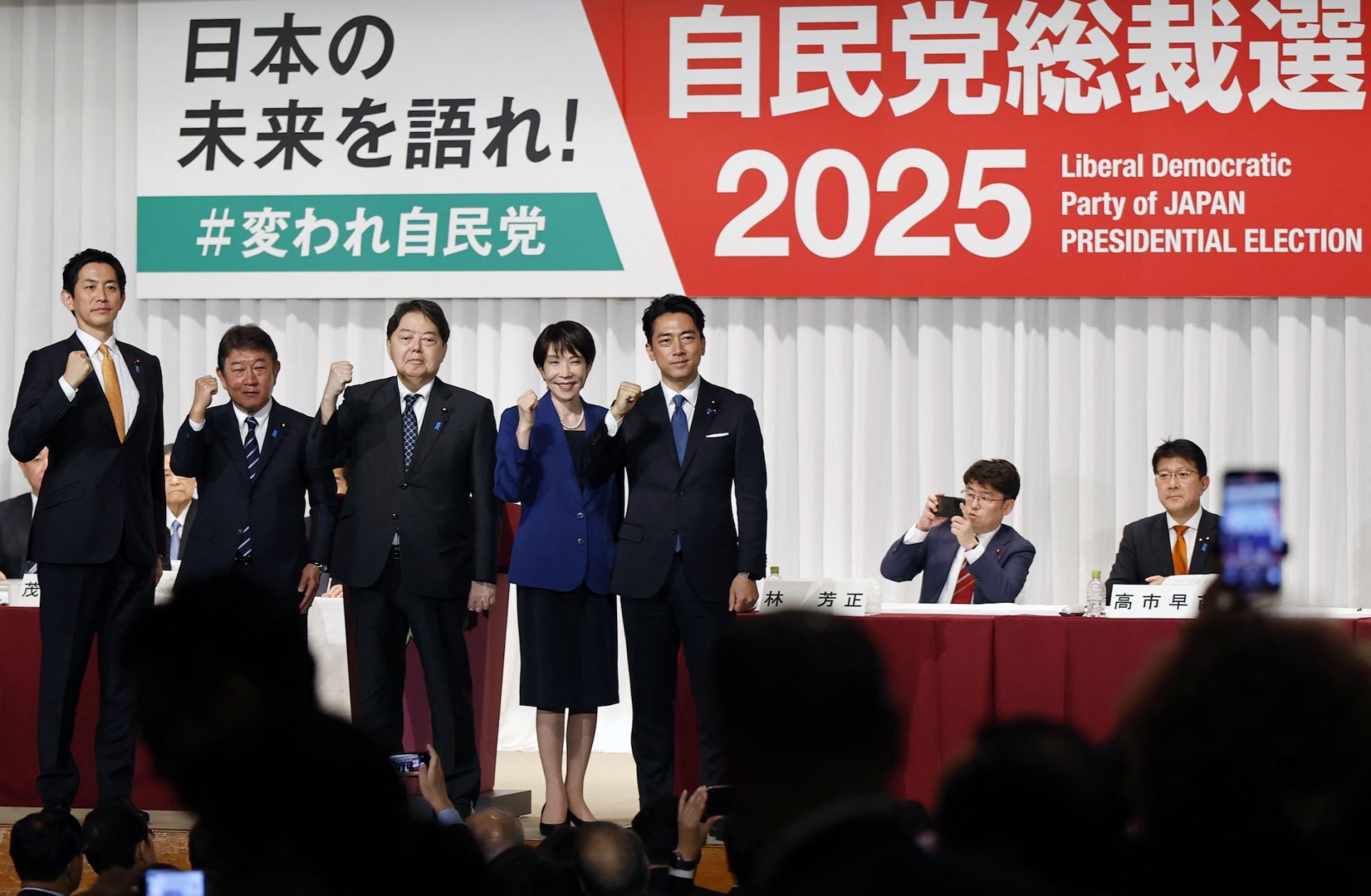 The candidates running in the leadership election of Japan's ruling Liberal Democratic Party -- (from left to right) Takayuki Kobayashi, Toshimitsu Motegi, Yoshimasa Hayashi, Sanae Takaichi and Shinjiro Koizumi -- pose after delivering speeches at the kick-off of the campaign in Tokyo on Sept. 22, 2025. 