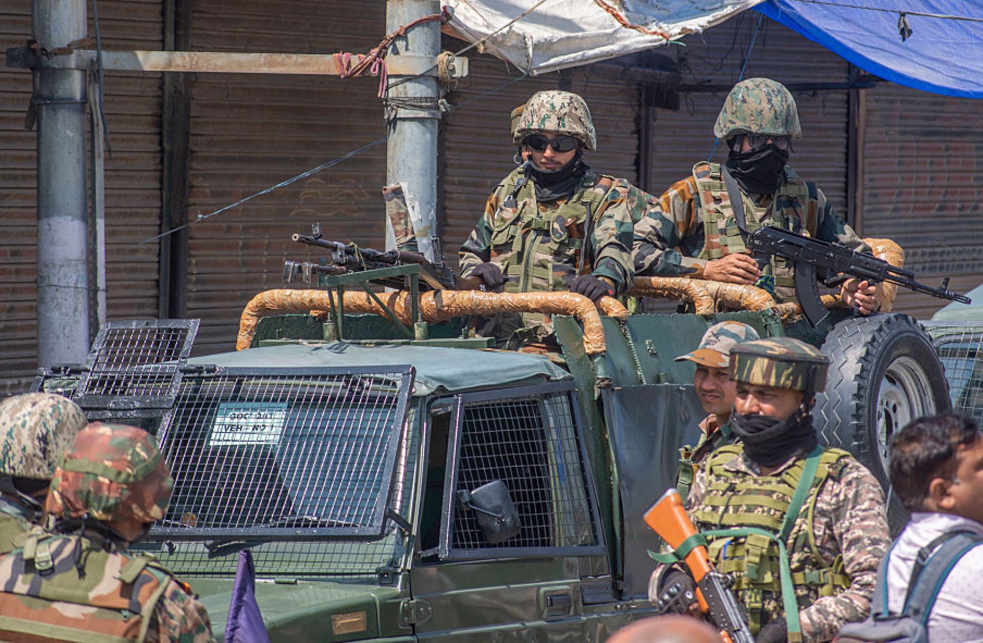 Indian soldiers stand guard atop their vehicle in Srinagar, India, on April 23, 2025, following a deadly militant attack on tourists in Indian-administered Kashmir.