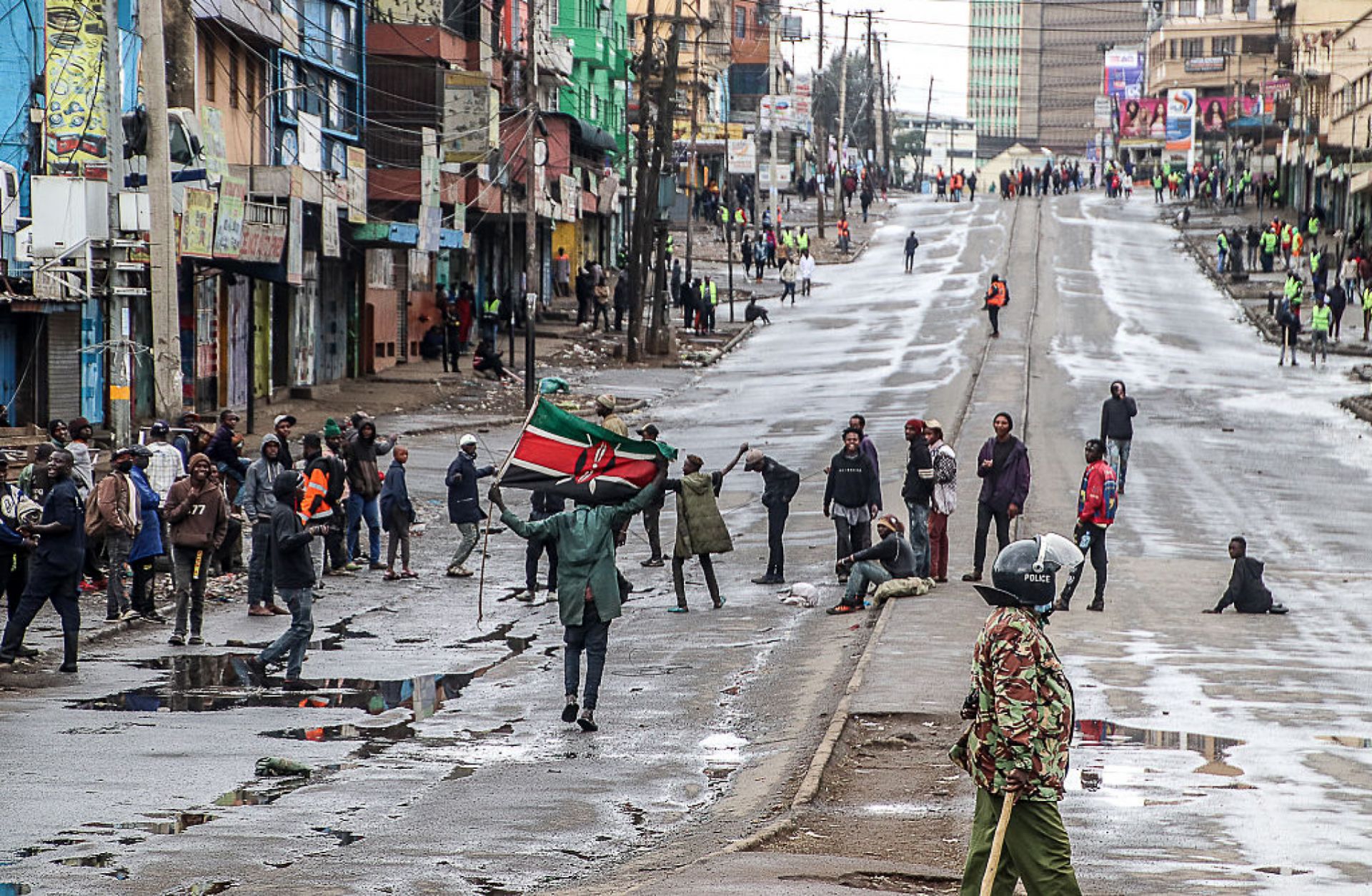 A demonstrator holds a Kenyan flag on a street in Nairobi, Kenya, during a pro-democracy protest on July 7, 2025. 
