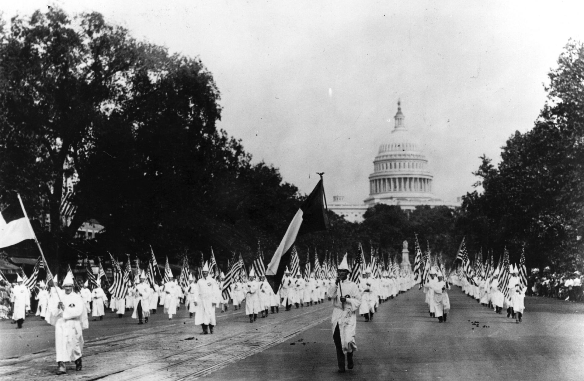 A Ku Klux Klan march Aug. 19, 1925, on Pennsylvania Avenue in Washington.