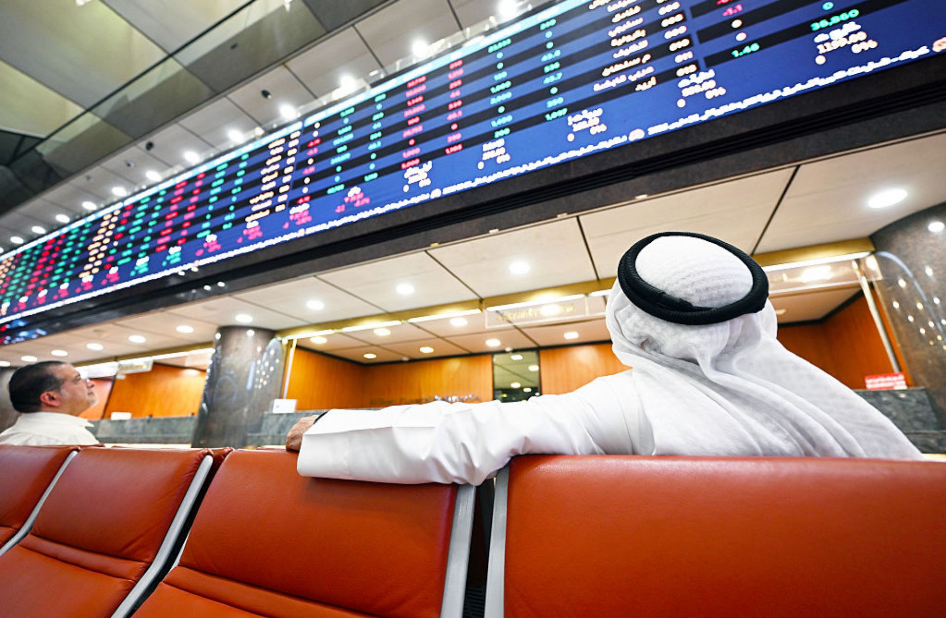 Kuwaiti traders follow the stock market activity at the Boursa Kuwait stock exchange building in Kuwait City on April 7, 2025. 
