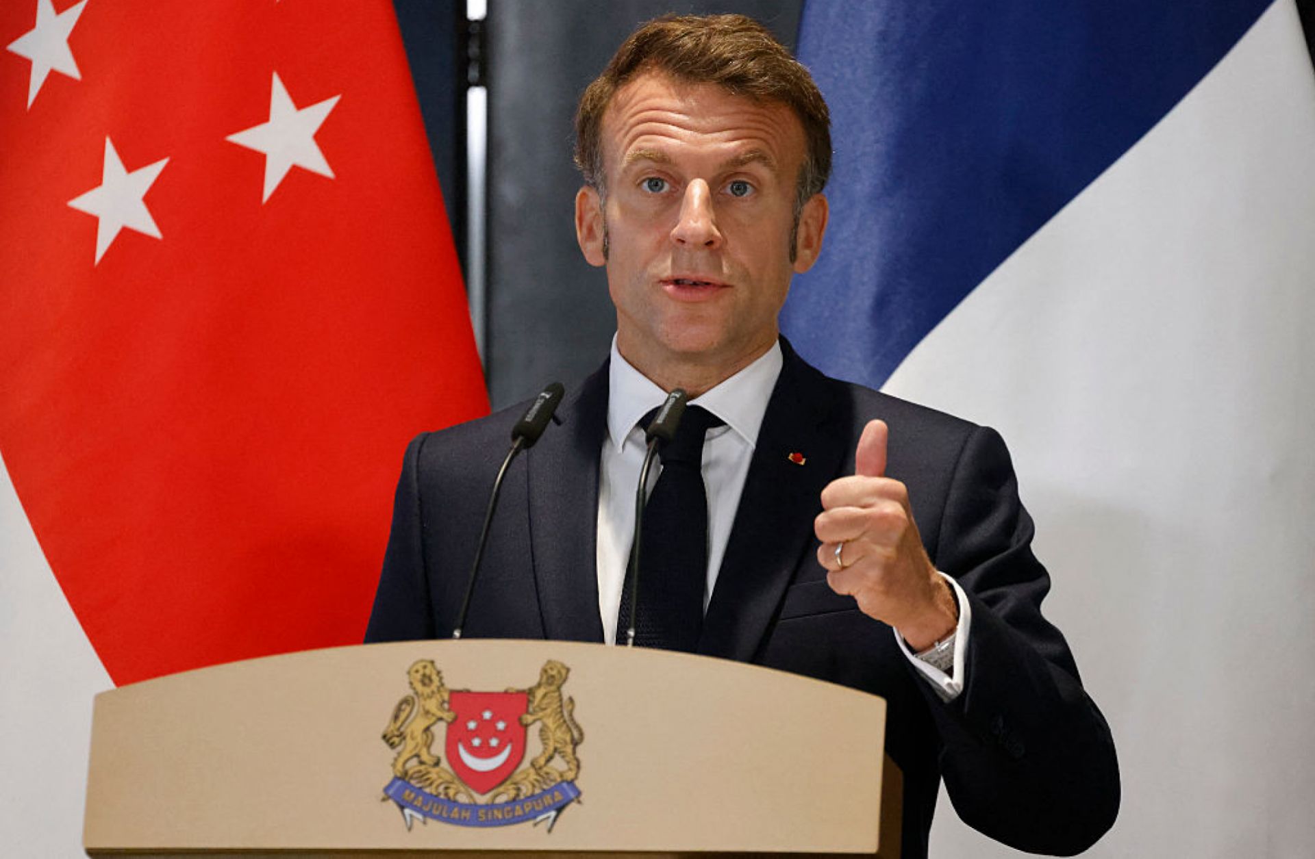 French President Emmanuel Macron holds a press briefing during his trip to Singapore on May 30, 2025. 