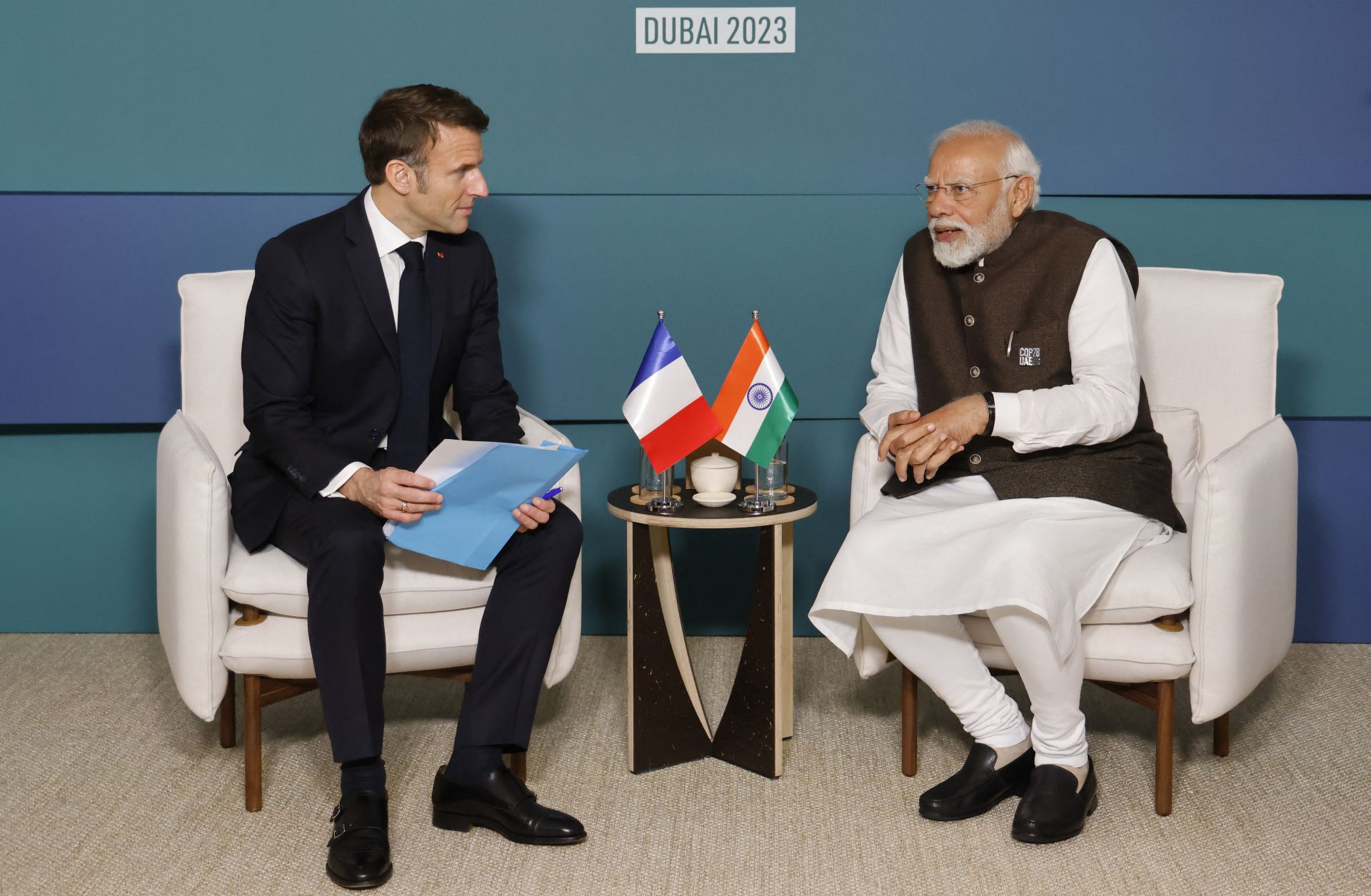 India Prime Minister Narendra Modi (R) meets with French President Emmanuel Macron on Dec. 1, 2023, in Dubai.