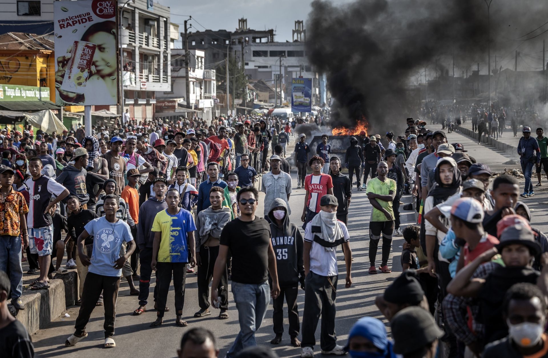 Protesters face police from a distance near burning barricades in Antananarivo, Madagascar, on Oct. 9, 2025. Protesters face police from a distance near burning barricades in Antananarivo, Madagascar, on Oct. 9, 2025.