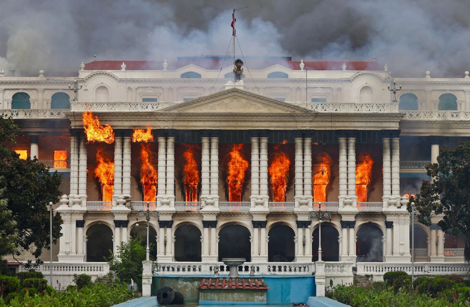 Fire rages through the Singha Durbar, the main administrative building for the Nepal government, in Kathmandu on Sept. 9, 2025, after youth protesters set fire to the building.  Fire rages through the Singha Durbar, the main administrative building for the Nepal government, in Kathmandu on Sept. 9, 2025, after youth protesters set fire to the building.