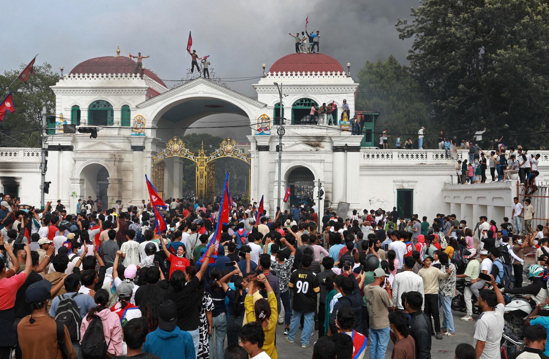 Protesters gather at the Singha Durbar, the main administrative building for the Nepal government, in Kathmandu on Sept. 9, 2025. 