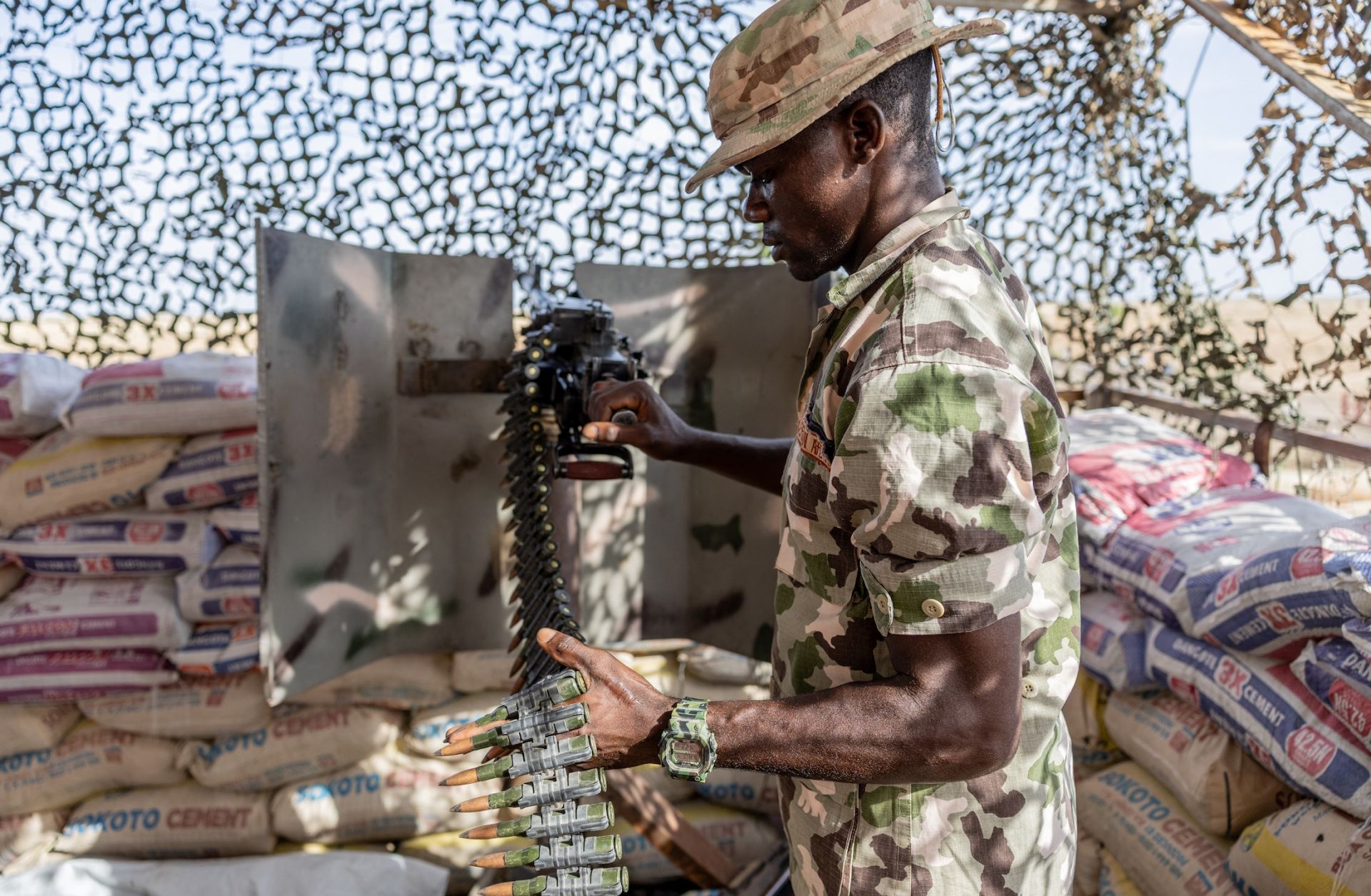 A Nigerian soldier stands guard at a checkpoint at the entrance to Monguno, Borno state, Nigeria, on July 4, 2025. A Nigerian soldier stands guard at a checkpoint at the entrance to Monguno, Borno state, Nigeria, on July 4, 2025.
