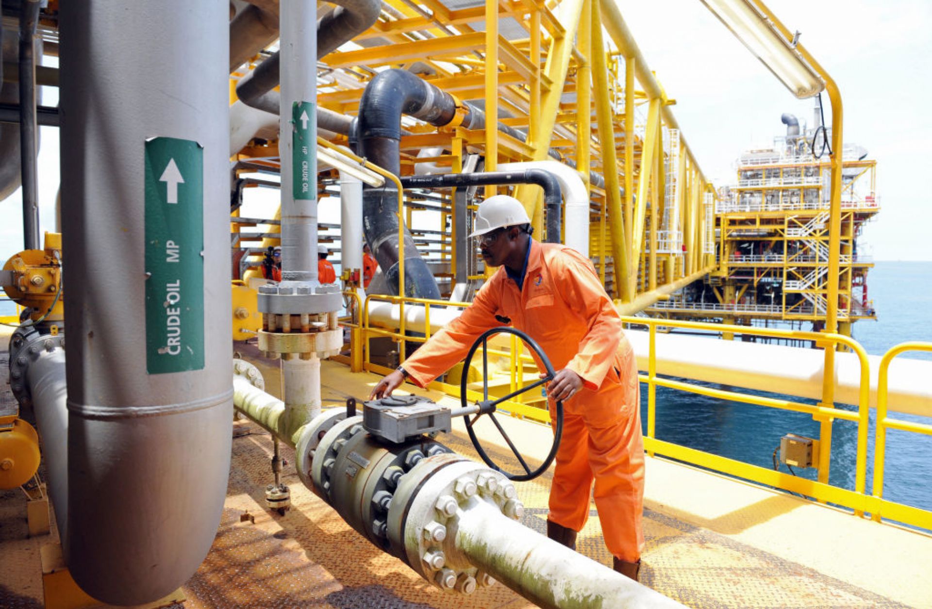A worker inspects an oil drilling platform located roughly 35 kilometers away from Port Harcourt in the Niger Delta. A worker inspects an oil drilling platform located roughly 35 kilometers away from Port Harcourt in the Niger Delta.