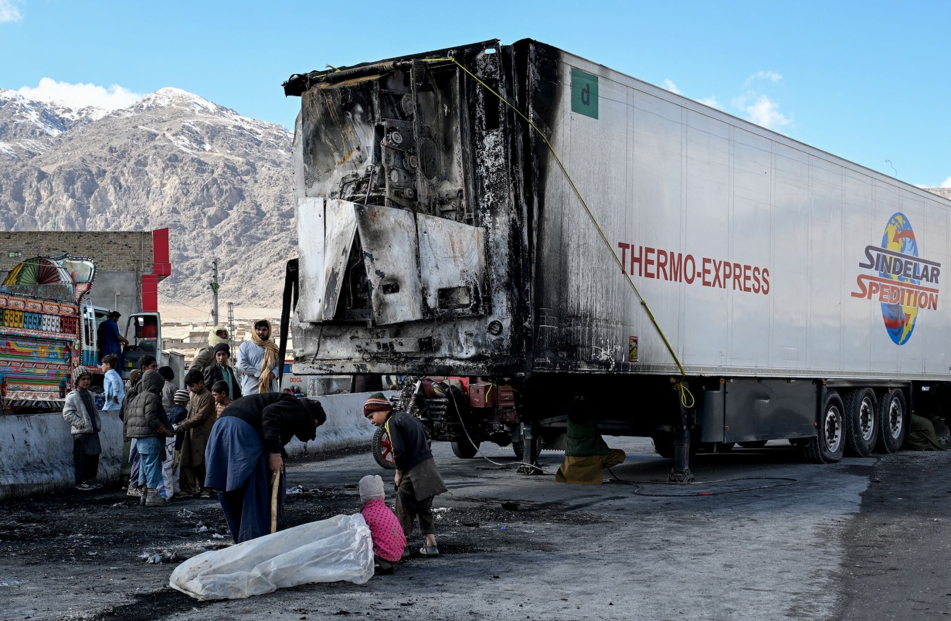 A burned-out vehicle along a road on the outskirts of the Pakistani city of Quetta on Feb. 1, 2026, a day after an attack by Baloch separatists.