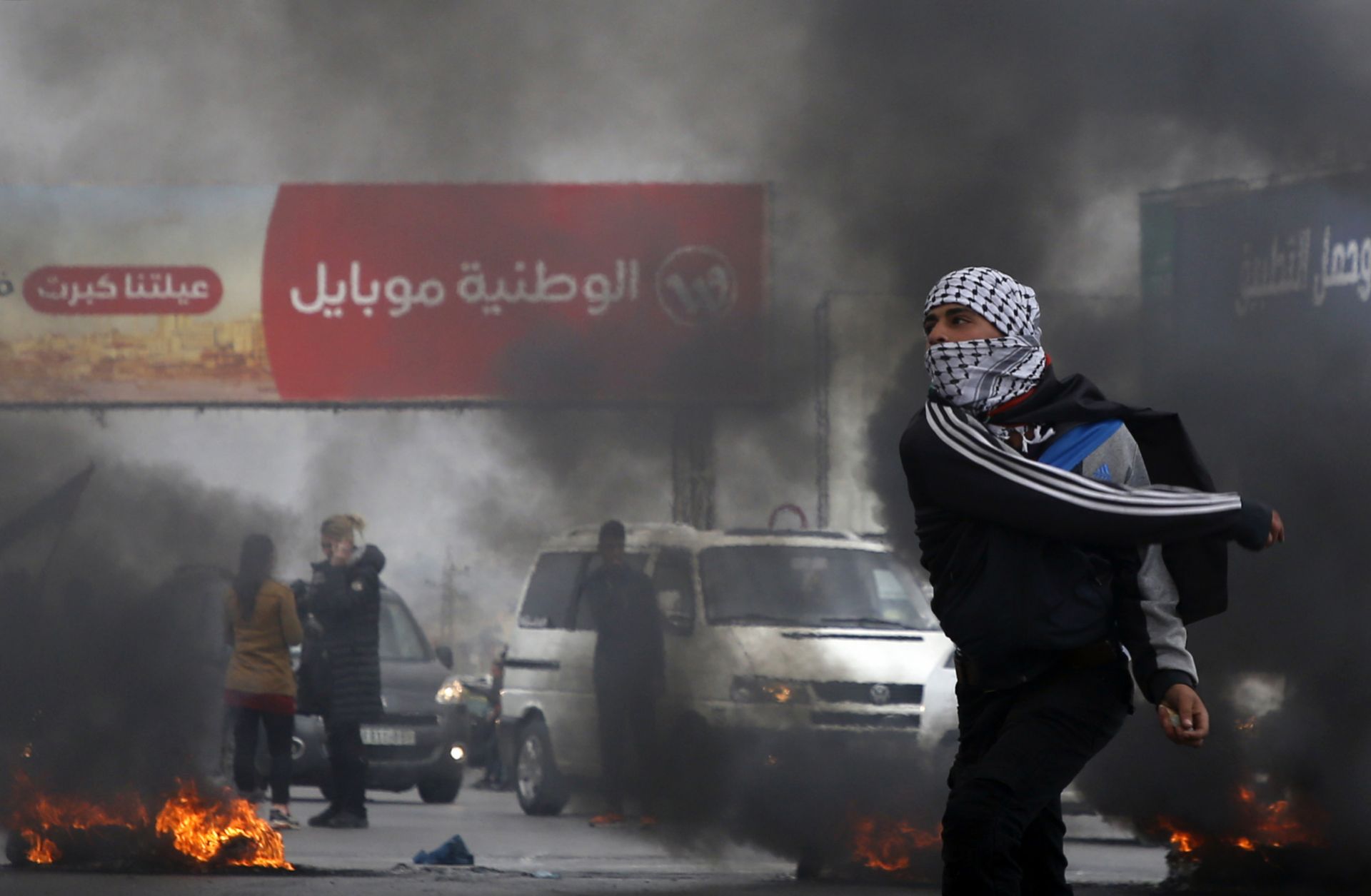 Palestinian protesters clash with Israeli security forces south of the West Bank city of Nablus on Dec. 29, 2017. 