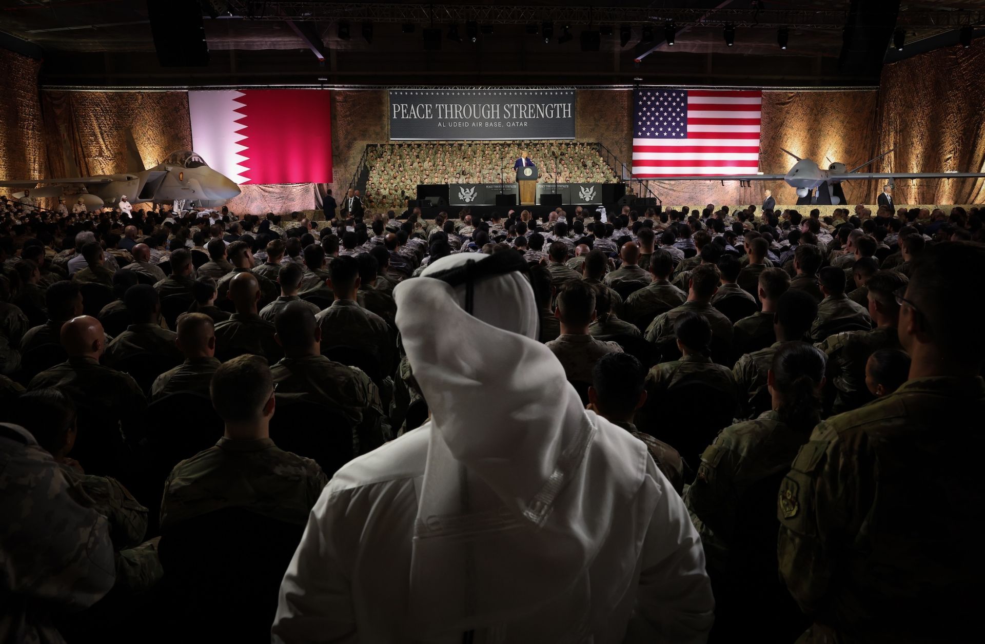 U.S. President Donald Trump delivers remarks to U.S. and Qatari military personnel at the Al Udeid Air Base in Doha, Qatar, on May 15, 2025.
