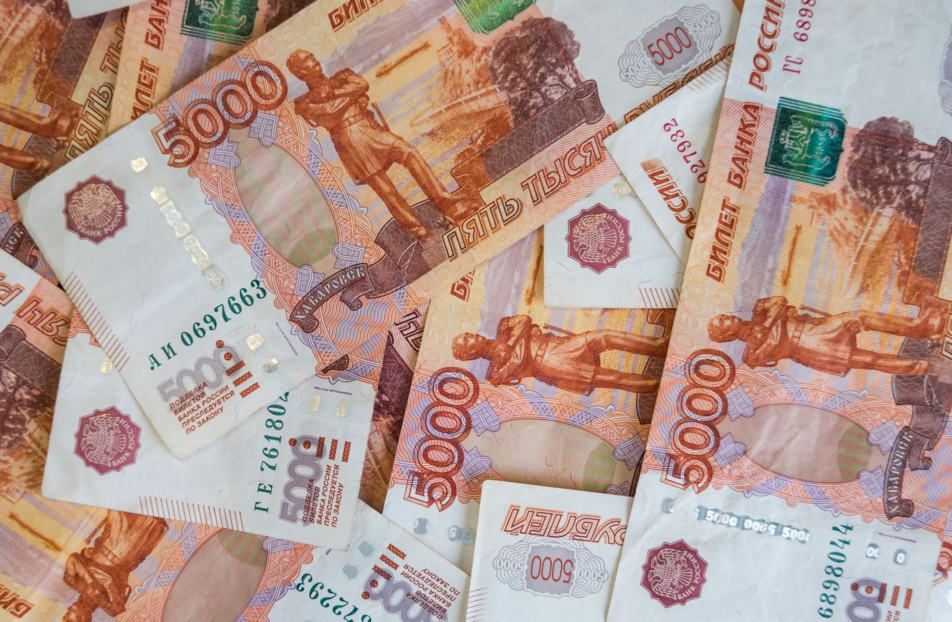 This photo is a close-up shot of Russian ruble banknotes.