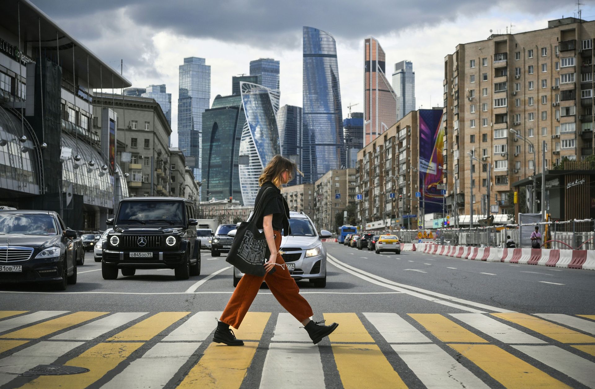 This photo shows a woman crossing a street near downtown Moscow, Russia.