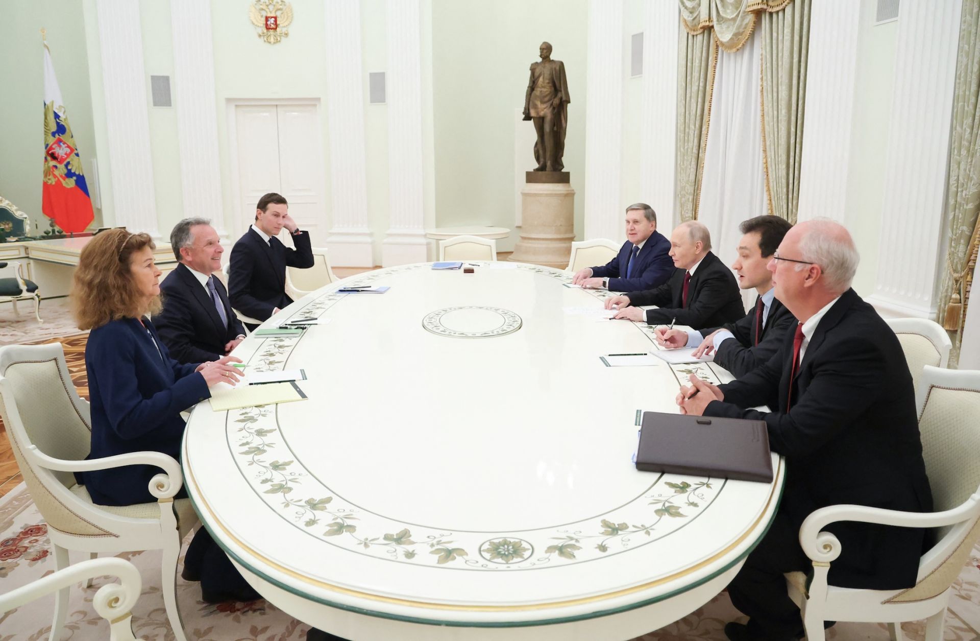 Russia's President Vladimir Putin, accompanied by Kremlin economic envoy Kirill Dmitriev and Kremlin aide Yuri Ushakov, meets with US special envoy Steve Witkoff and US President Donald Trump's son-in-law Jared Kushner at the Kremlin in Moscow on Dec. 2, 2025.