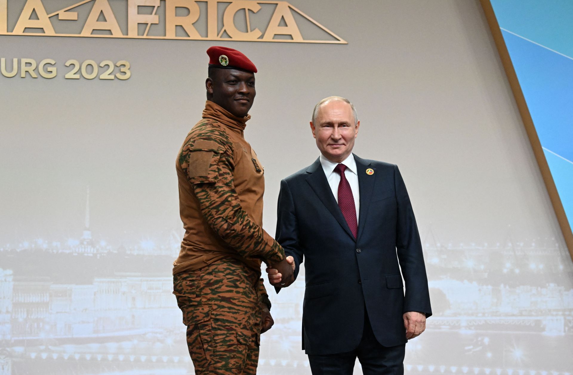 Russian President Vladimir Putin greets Burkina Faso's junta leader Capt. Ibrahim Traore during a welcoming ceremony at the second Russia-Africa summit in Saint Petersburg, Russia, on July 27, 2023.