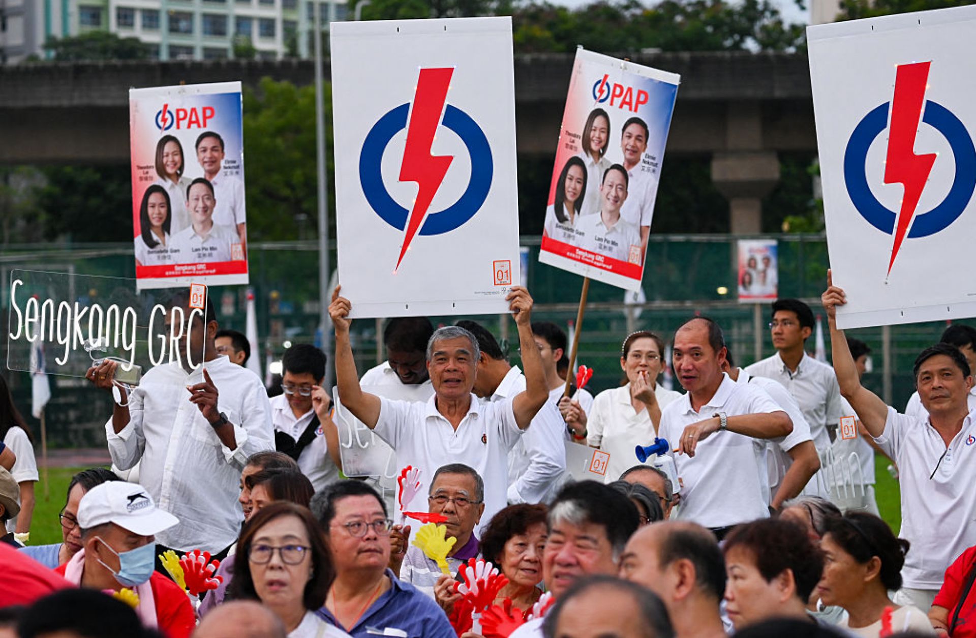 Supporters of Singapore's ruling People's Action Party attend an election rally on May 1, 2025. Supporters of Singapore's ruling People's Action Party attend an election rally on May 1, 2025.