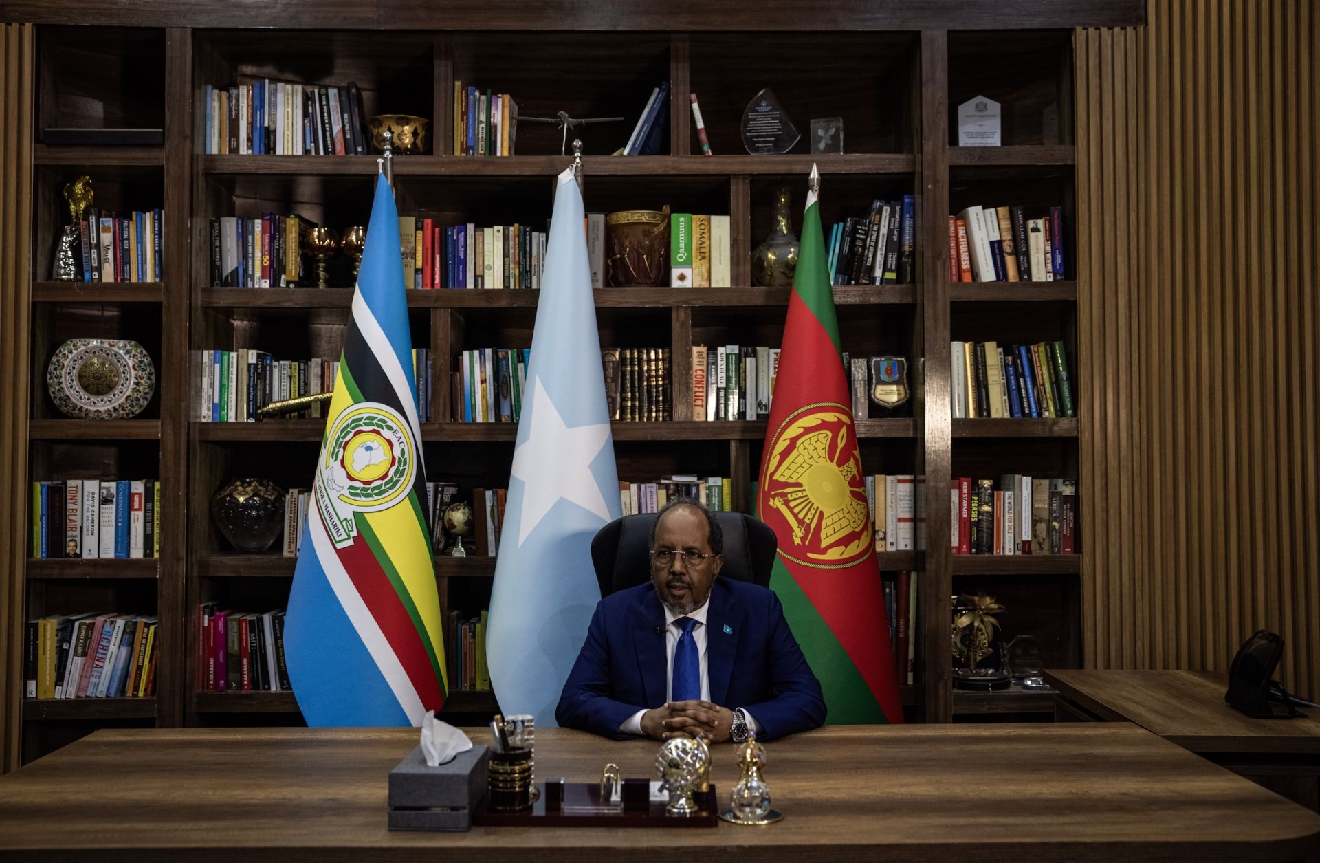 Somali President Hassan Sheikh Mohamud sits in his office as he speaks to journalists at Villa Somalia, the palace and principal workplace of the president, on April 22, 2025, in central Mogadishu, Somalia.