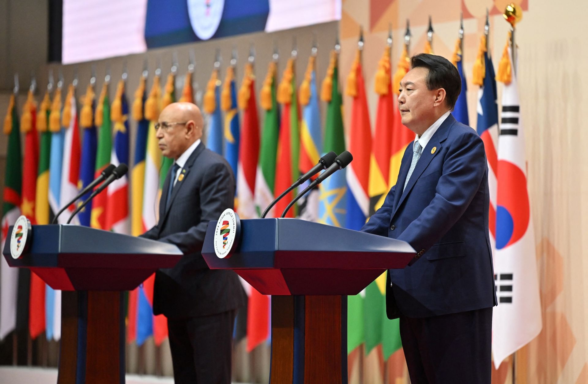 South Korean President Yoon Suk Yeol (R) speaks as Mauritanian President Mohamed Ould Ghazouani (L), chair of the African Union, listens during a joint press conference following the 2024 Korea-Africa Summit in Goyang, South Korea, on June 4, 2024.
