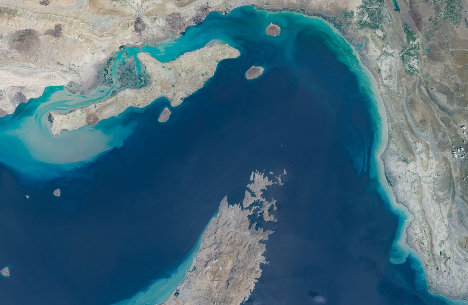 Satellite imagery shows a broad view of the Strait of Hormuz between southern Iran and Oman's Musandam Peninsula on April 7, 2026.