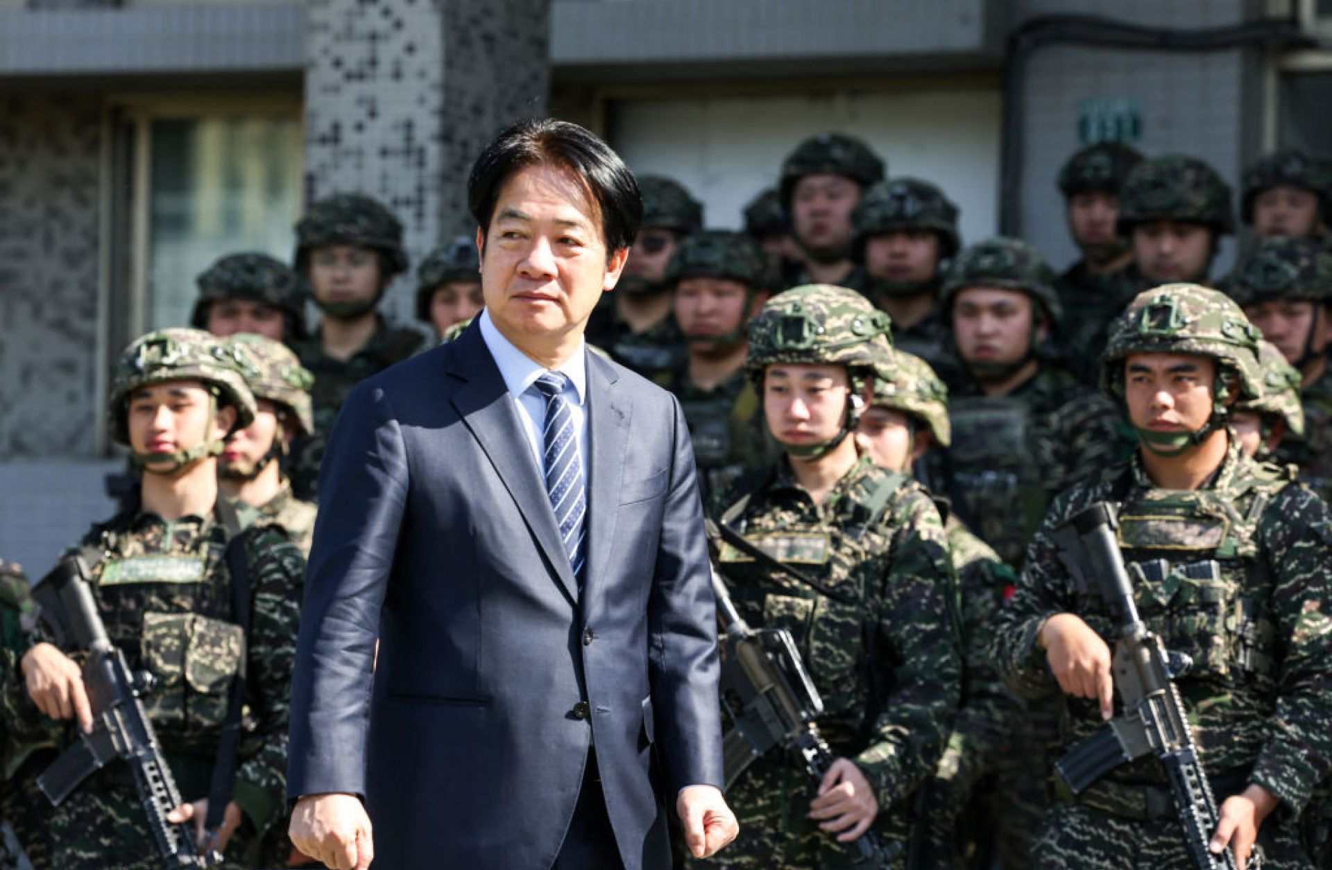 Taiwan's President Lai inspects troops taking part in the Rapid Response Exercise at the Songshan military airbase in Taipei on March 21, 2025.