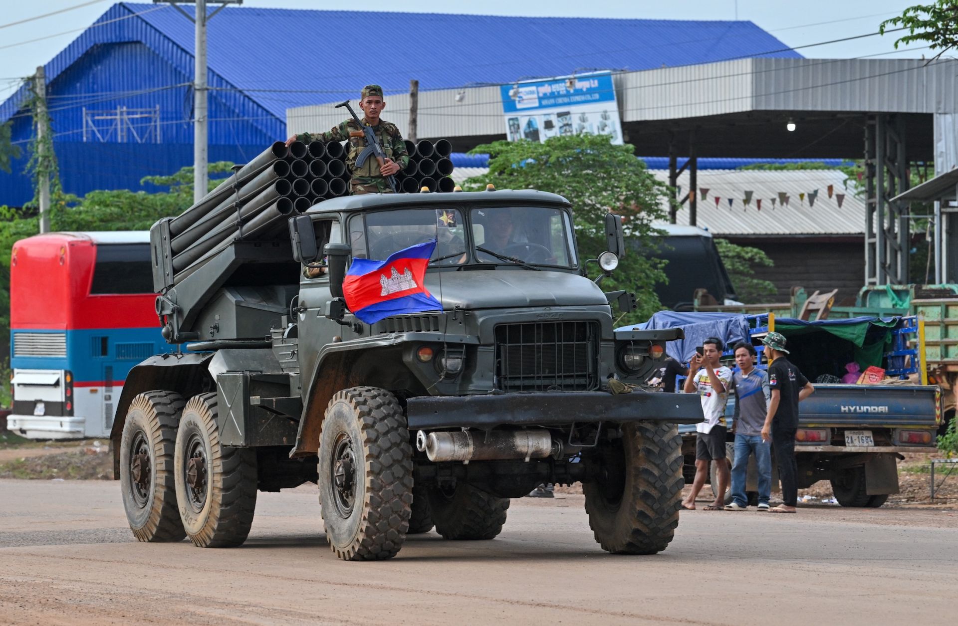 A Cambodian soldier stands on a truck with a rocket launcher in Cambodia's Oddar Meanchey province, which borders Thailand, on July 25, 2025. 