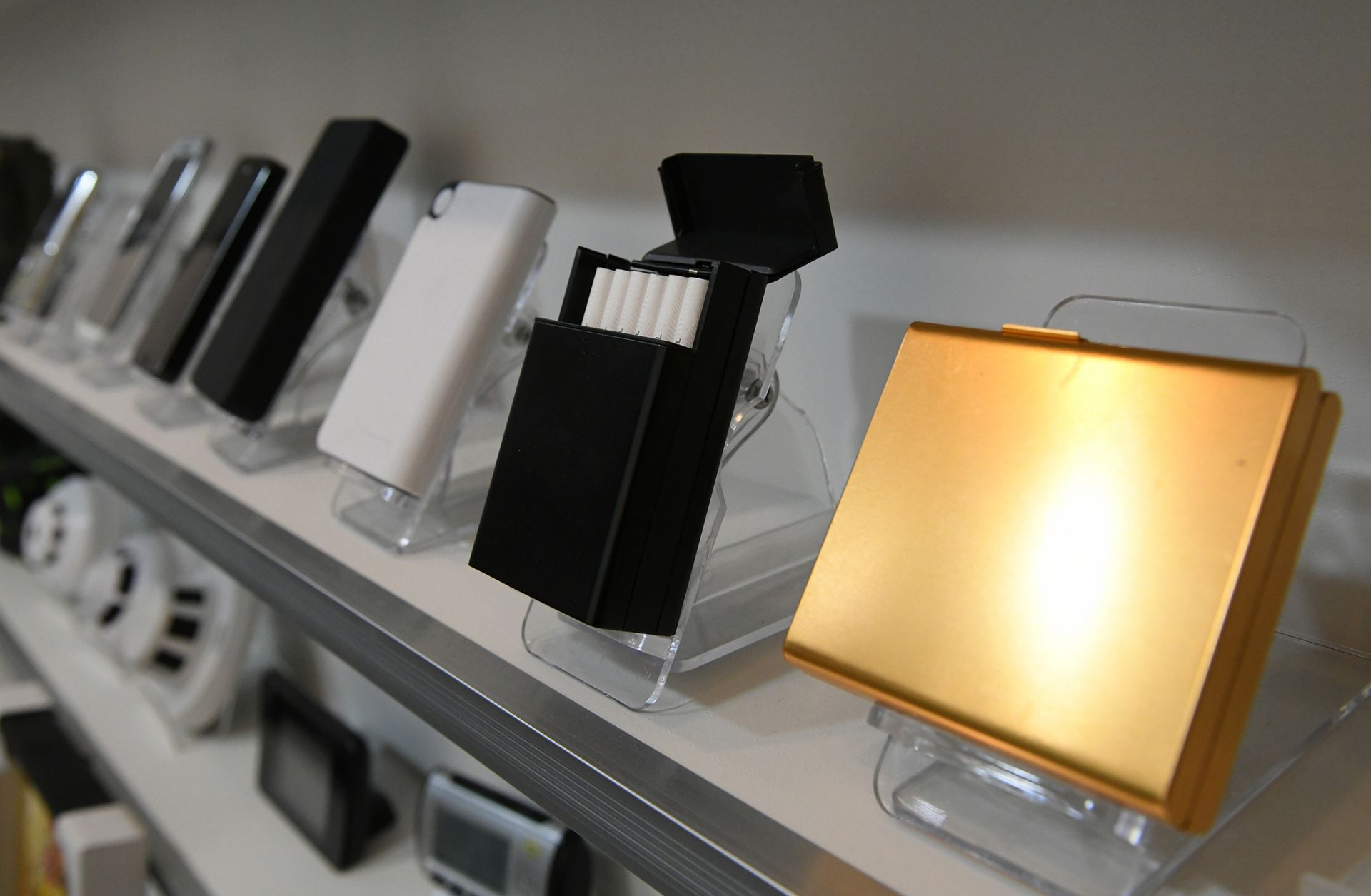 A shop in South Korea displays cigarette cases equipped with hidden cameras, among a wide selection of other spy cam devices. 