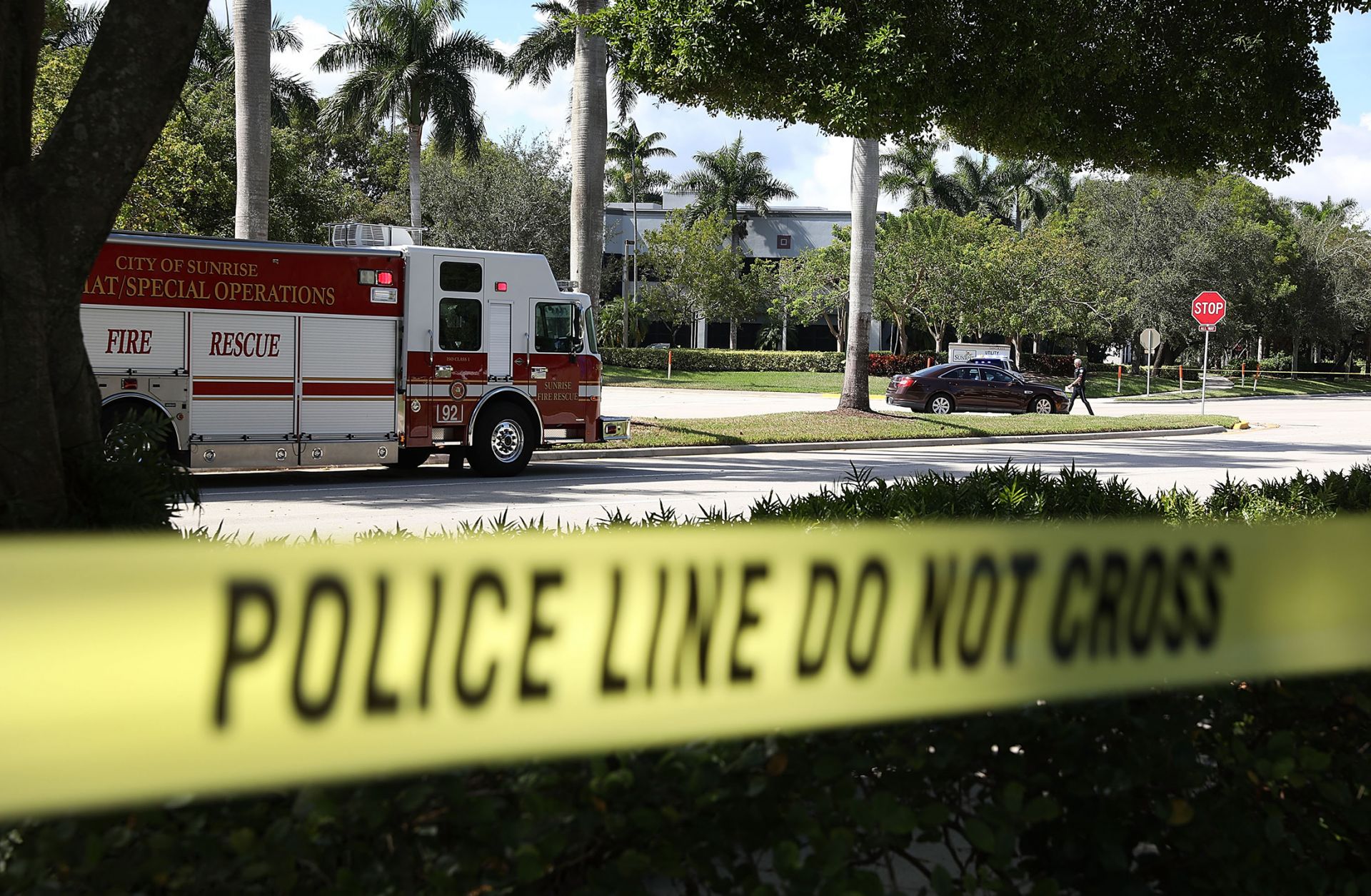 The bomb squad of the Broward County Sheriff's Office uses a robotic vehicle to investigate a suspicious package at the building housing an office for U.S. Rep. Debbie Wasserman Schultz (D-FL)  in Sunrise, Florida, on Oct. 24, 2018. 