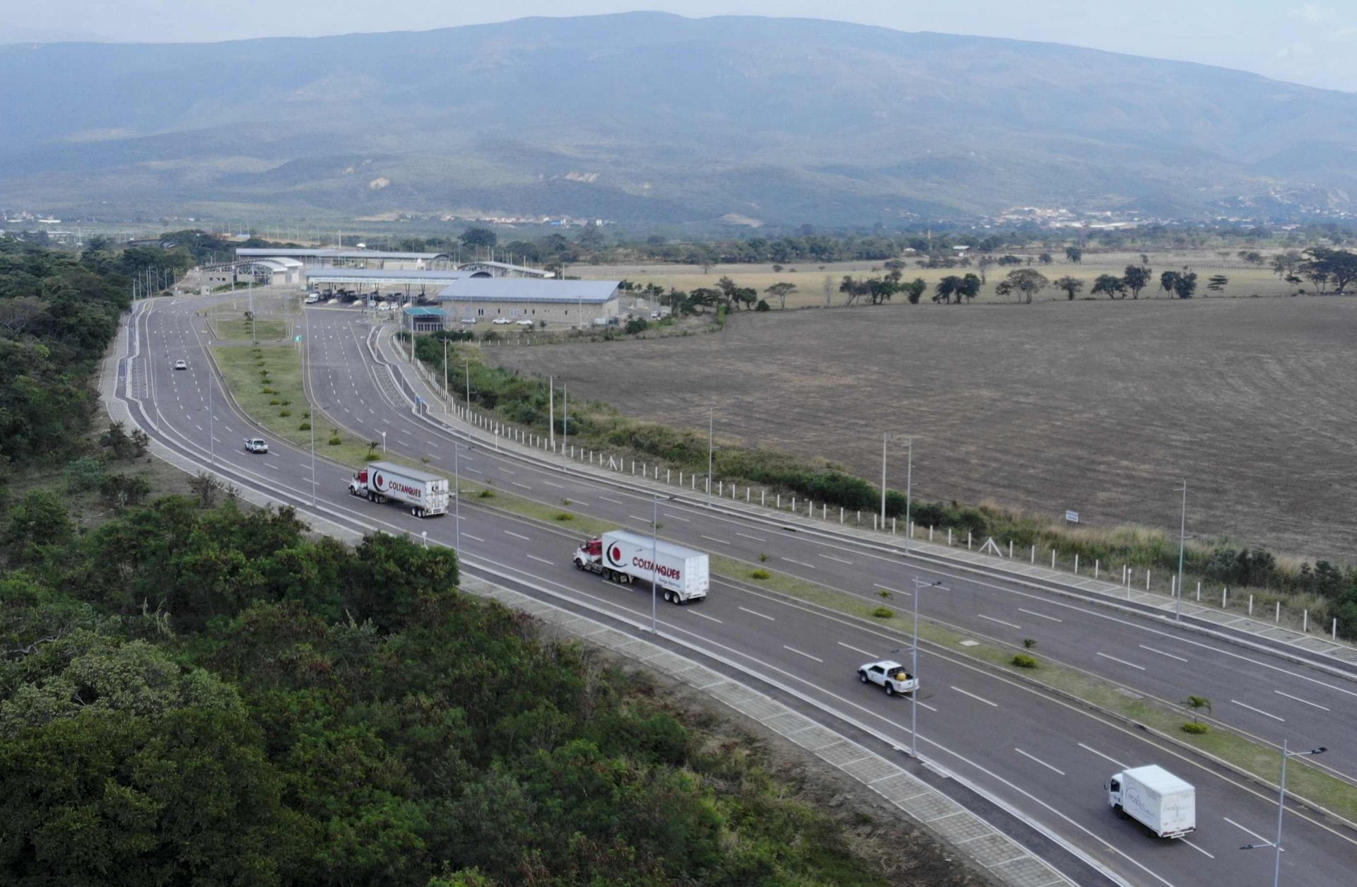 Trucks loaded with humanitarian aid for Venezuela arrive at the border between Colombia and Venezuela on February 7, 2018