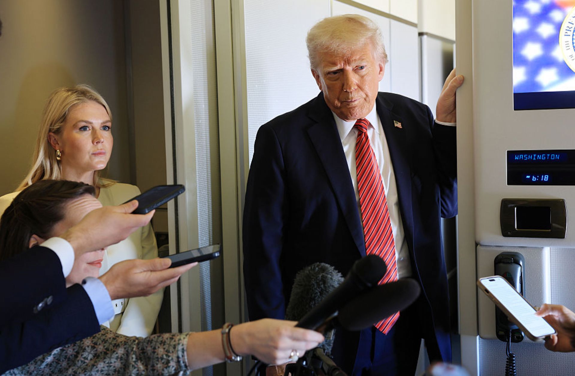 U.S. President Donald Trump talks to reporters aboard Air Force One on May 14, 2025, as he flies to Doha, Qatar, for his first trip to the Middle East since returning to the White House. U.S. President Donald Trump talks to reporters aboard Air Force One on May 14, 2025, as he flies to Doha, Qatar, for his first trip to the Middle East since returning to the White House.